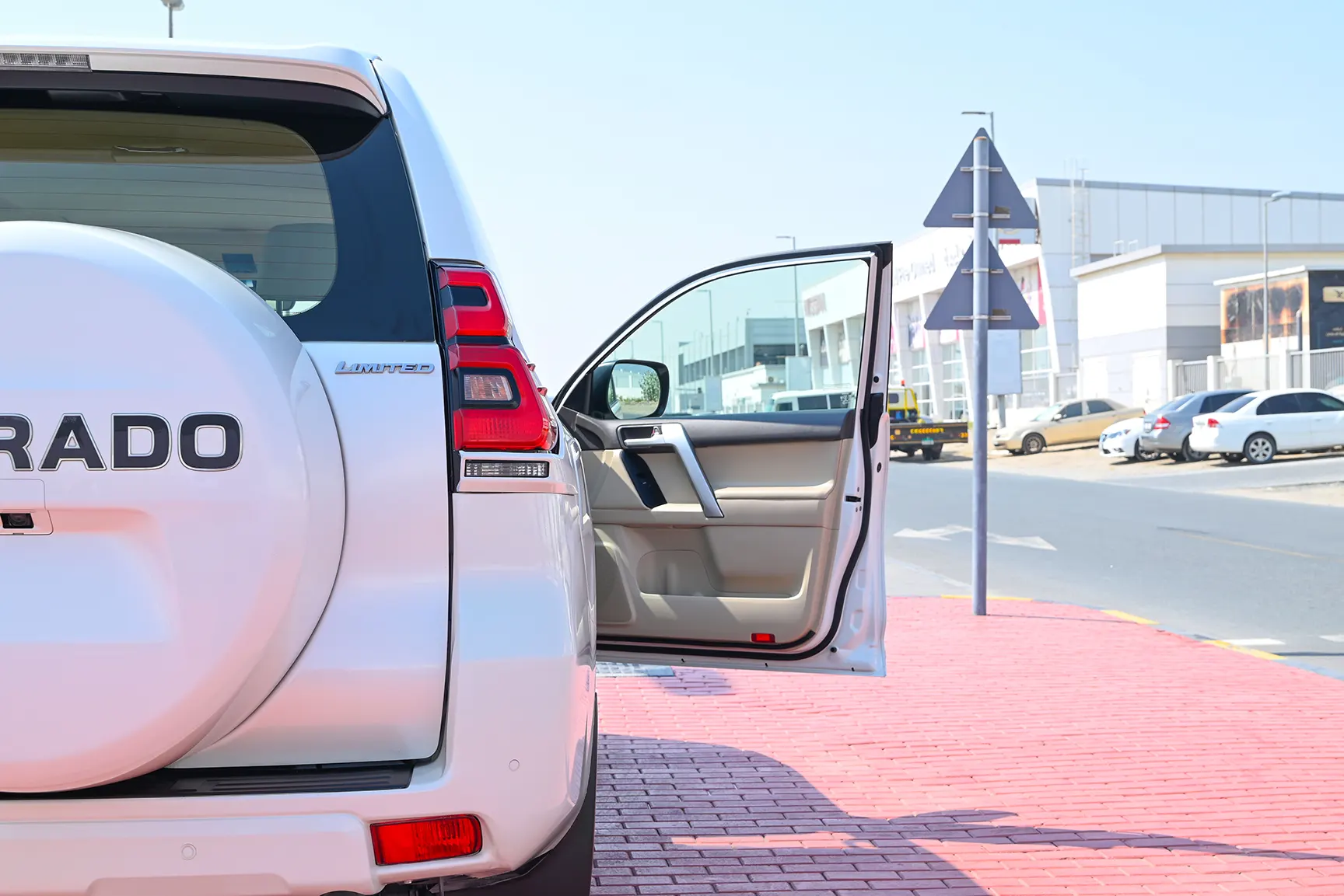 Used 2019 Toyota Prado Limited White – Taillight Close-up at First Choice Cars Sharjah