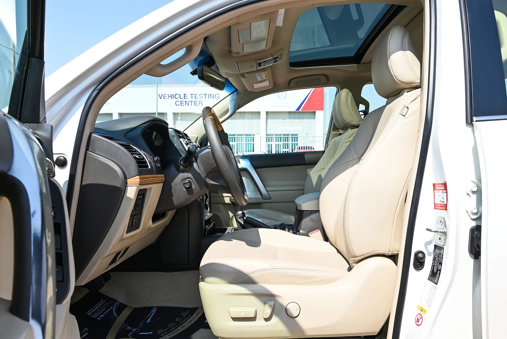 Used 2019 Toyota Prado Limited White – Front Driver Side Cabin View at First Choice Cars Sharjah