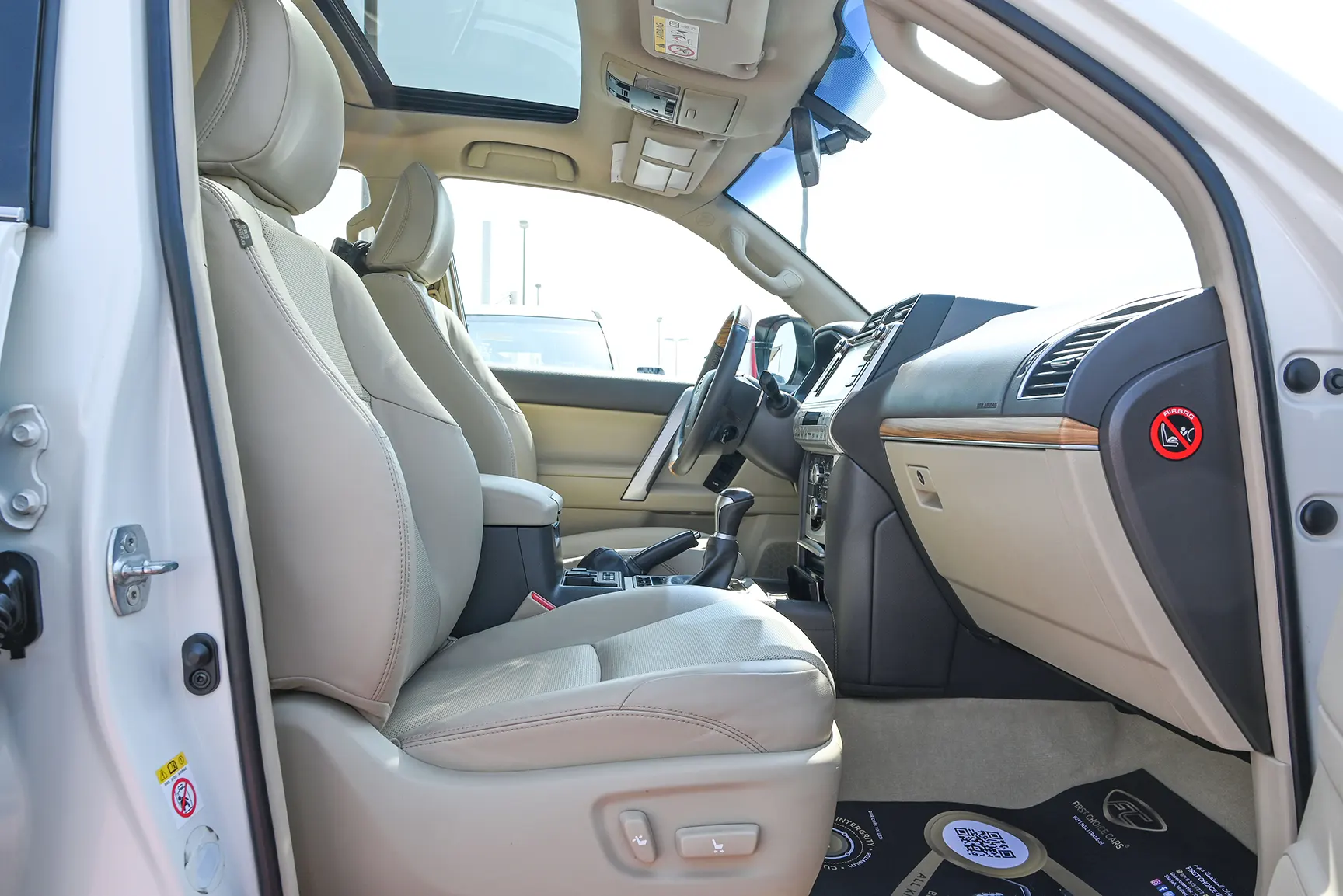 Used 2019 Toyota Prado Limited White – Front Passenger Side Cabin View at First Choice Cars Sharjah