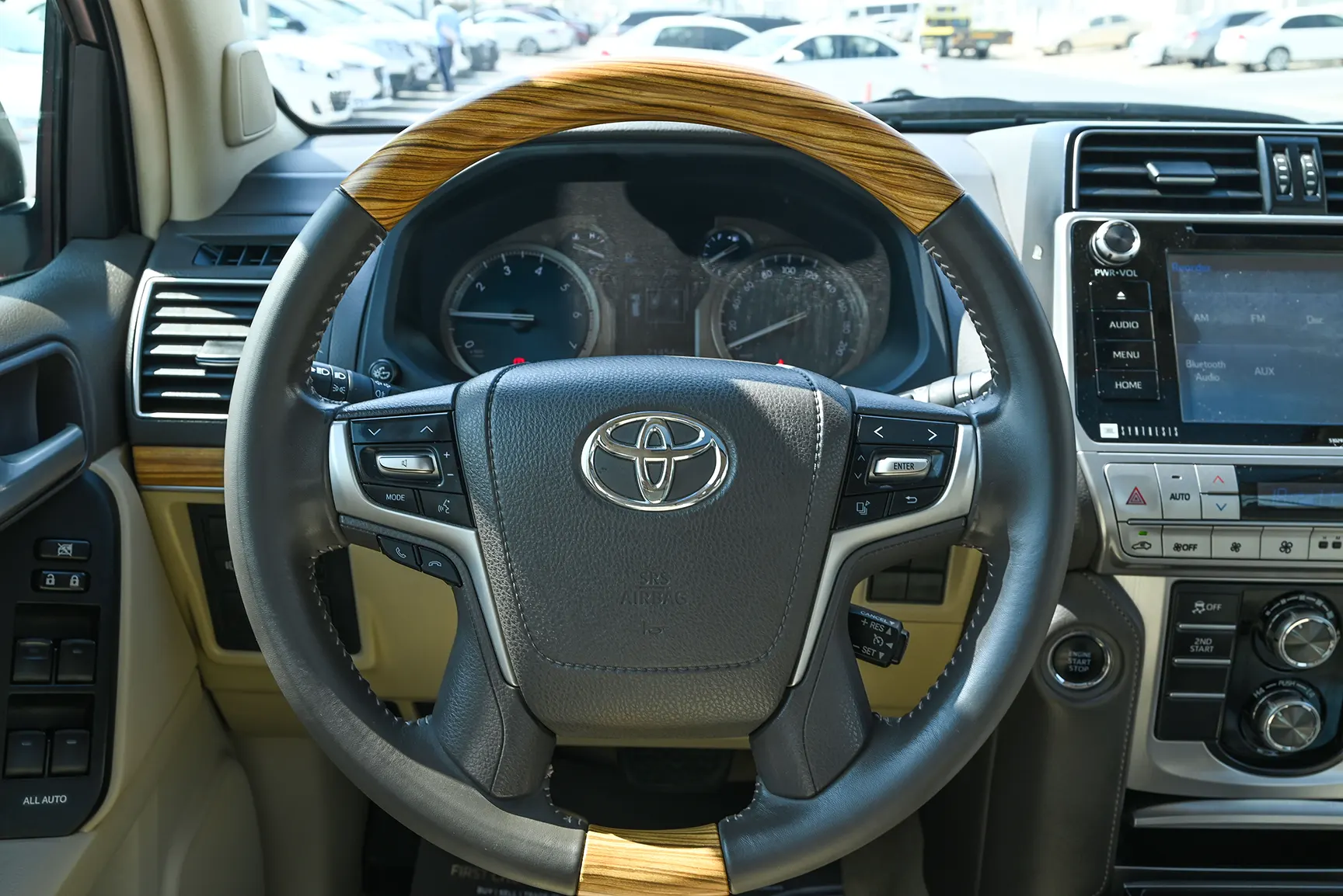 Used 2019 Toyota Prado Limited White – Driver Side Dashboard & Steering View at First Choice Cars Sharjah
