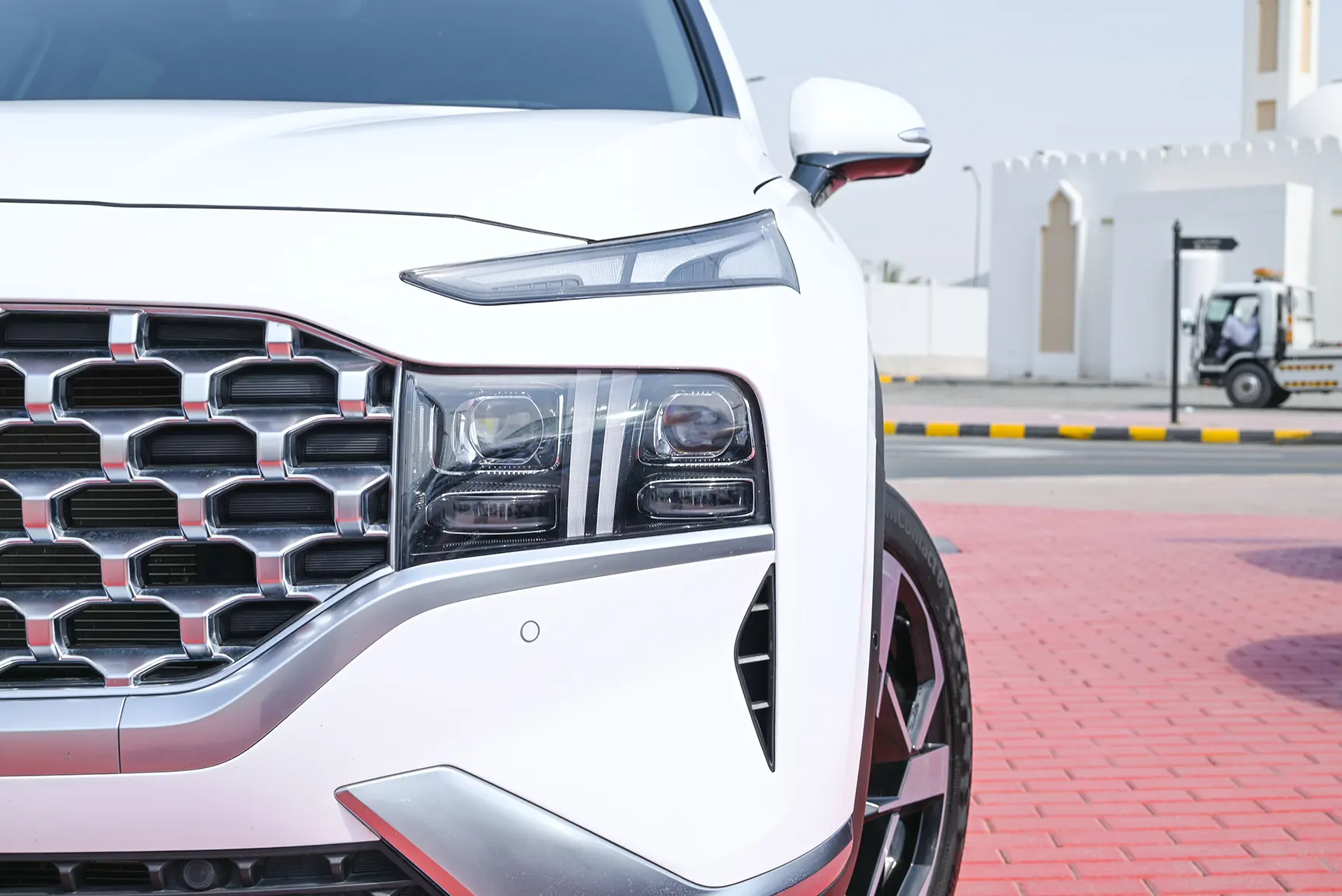 Used 2022 Hyundai Santa Fe GLS Premium White – Headlight Close-up at First Choice Cars Sharjah