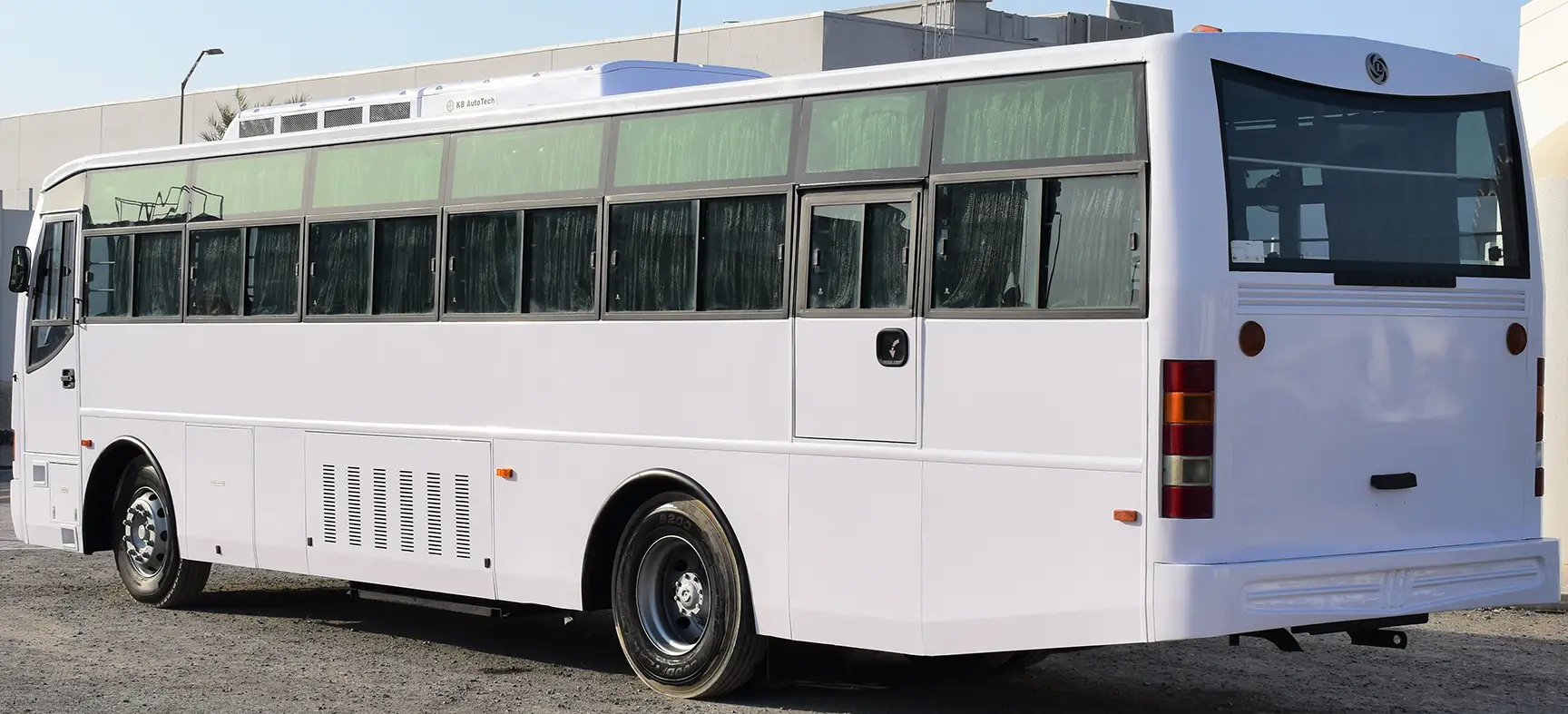 Used 2014 Ashok Leyland Falcon Bus White – Left Back Diagonal (45°) View at First Choice Cars Sharjah