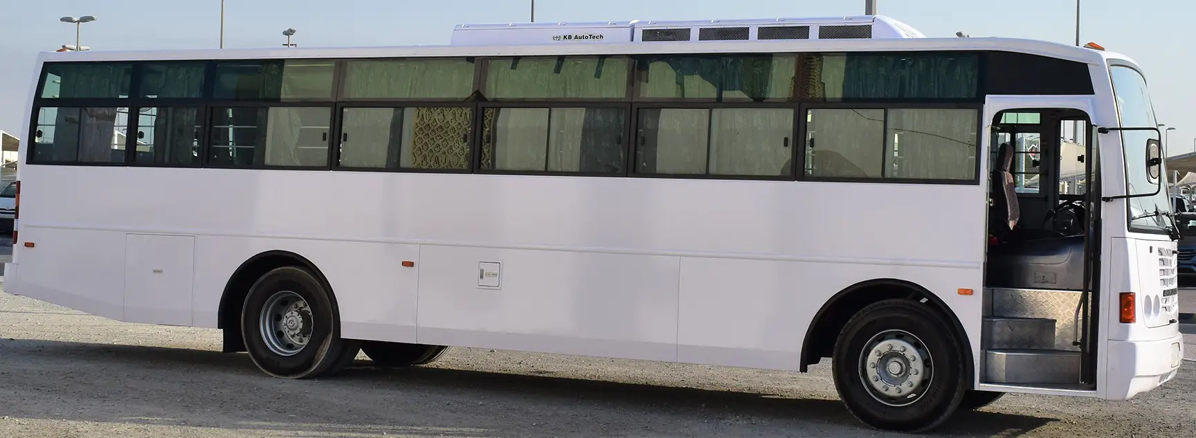 Used 2014 Ashok Leyland Falcon Bus White – Right Side View at First Choice Cars Sharjah