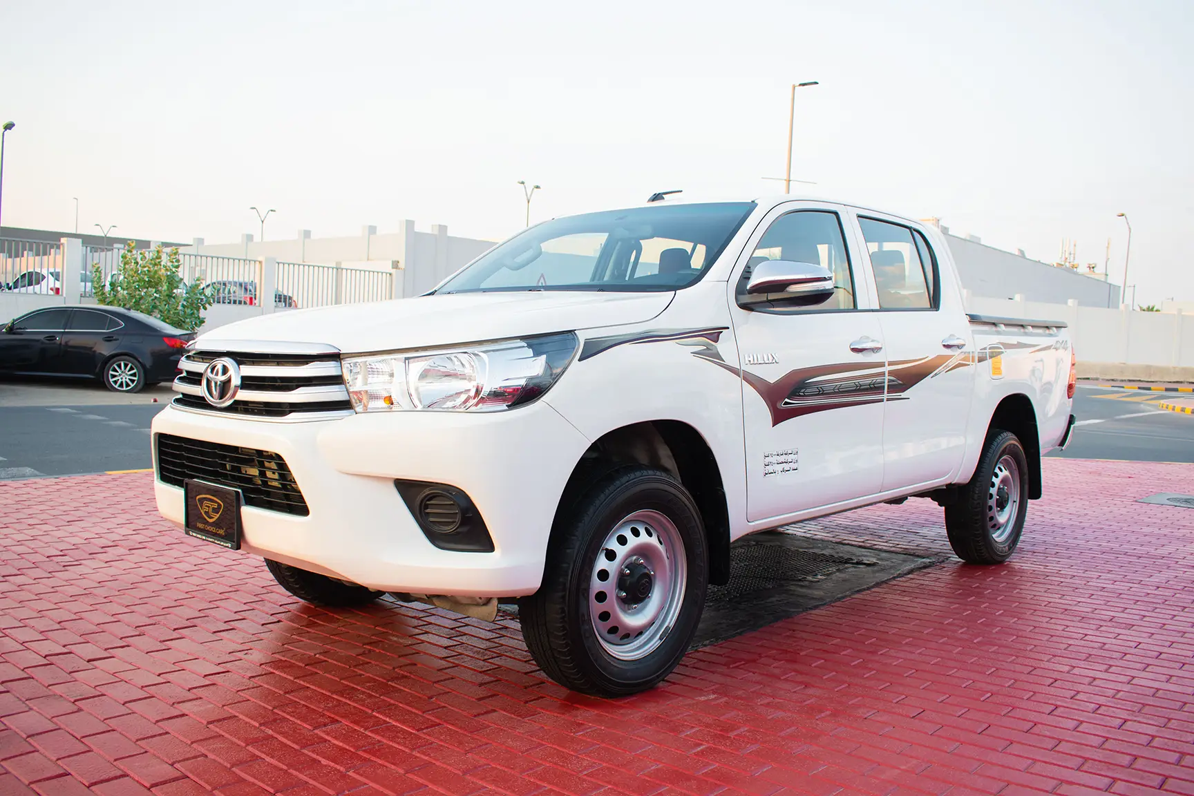 Used 2017 Toyota Hilux DLS Double Cabin White – Left Front Diagonal (45°) View at First Choice Cars Sharjah