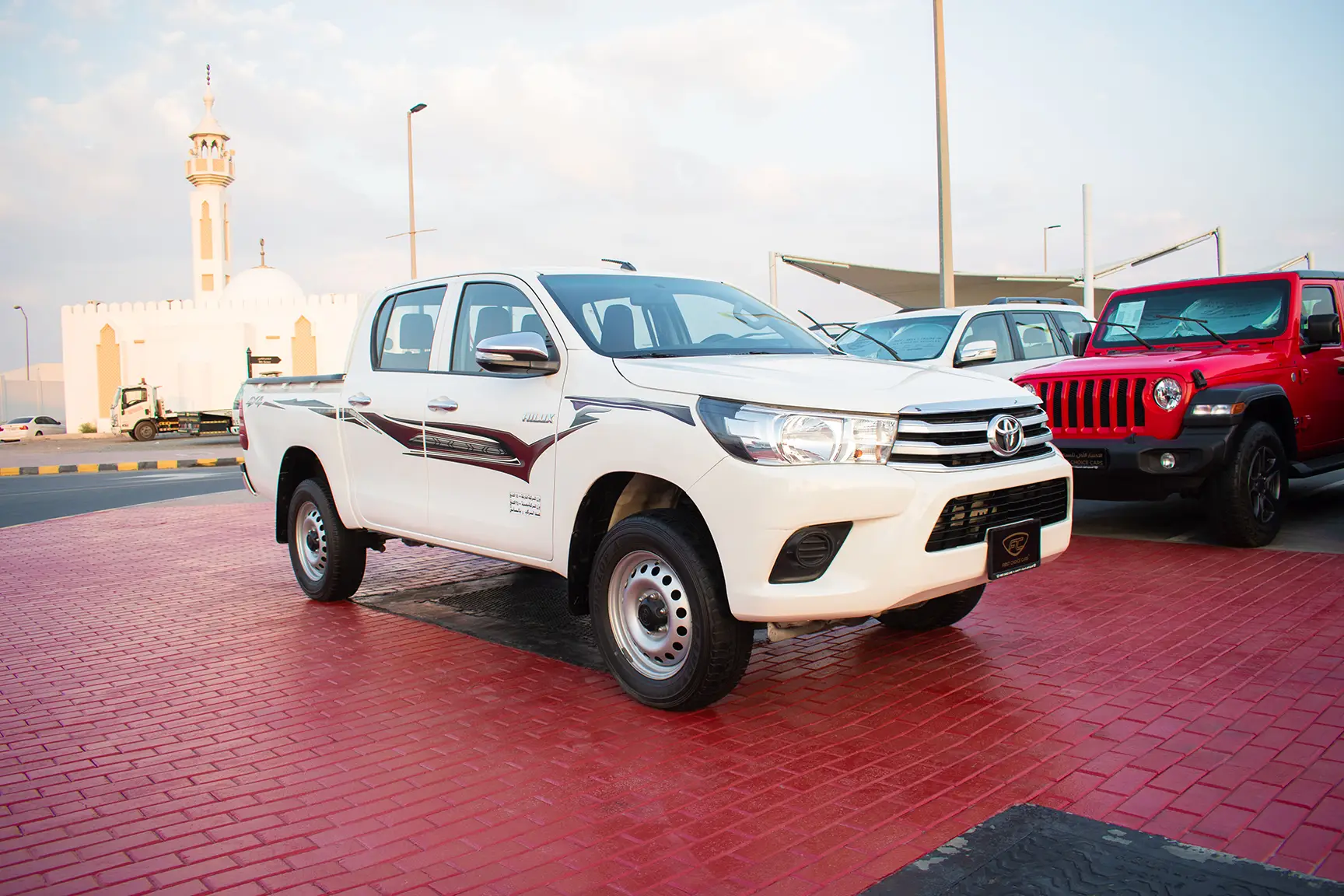 Used 2017 Toyota Hilux DLS Double Cabin White – Right Front Diagonal (45°) View at First Choice Cars Sharjah