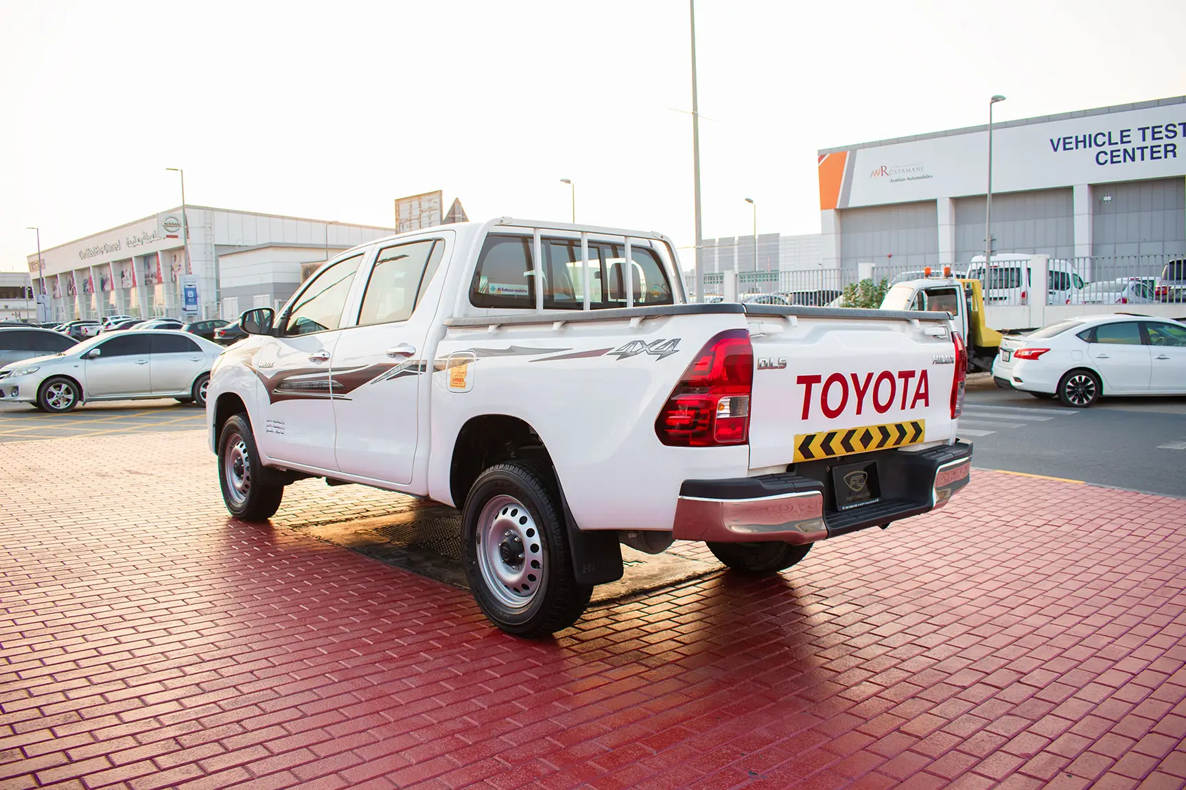 Used 2017 Toyota Hilux DLS Double Cabin White – Left Back Diagonal (45°) View at First Choice Cars Sharjah