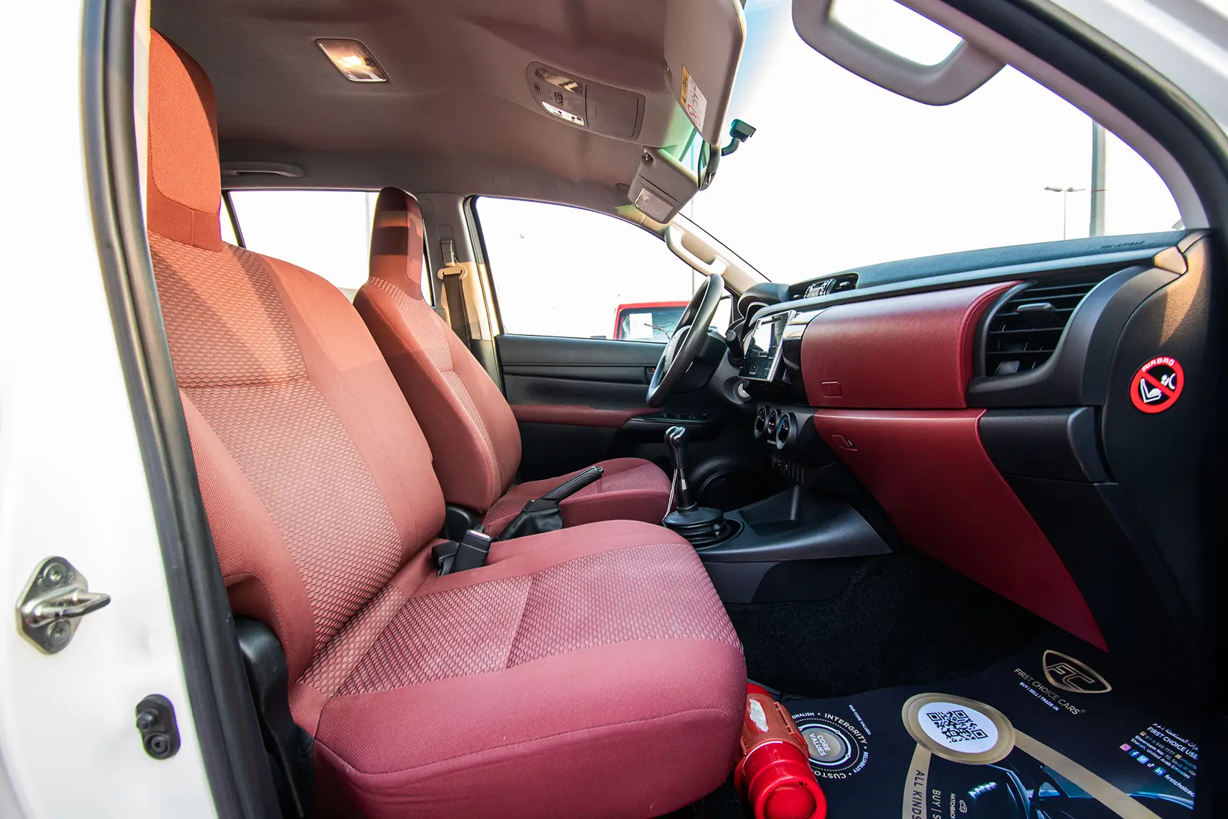 Used 2017 Toyota Hilux DLS Double Cabin White – Front Passenger Side Cabin View at First Choice Cars Sharjah