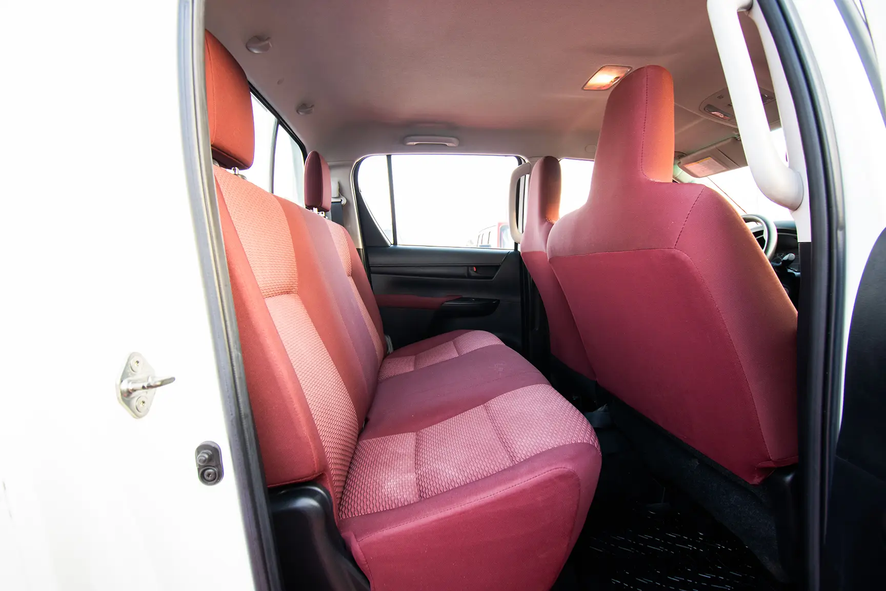 Used 2017 Toyota Hilux DLS Double Cabin White – Rear Passenger Side Cabin View at First Choice Cars Sharjah