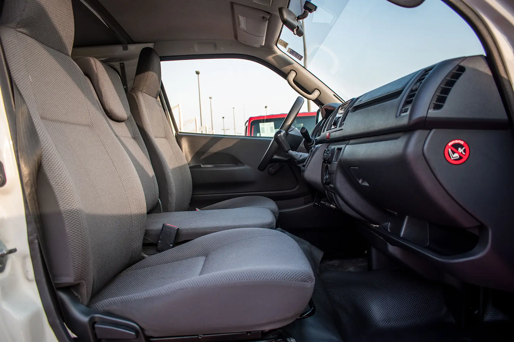 Used 2017 Toyota Hiace GL Standard Roof in White – Front Passenger Side Cabin View for Sale at First Choice Cars Dubai Sharjah