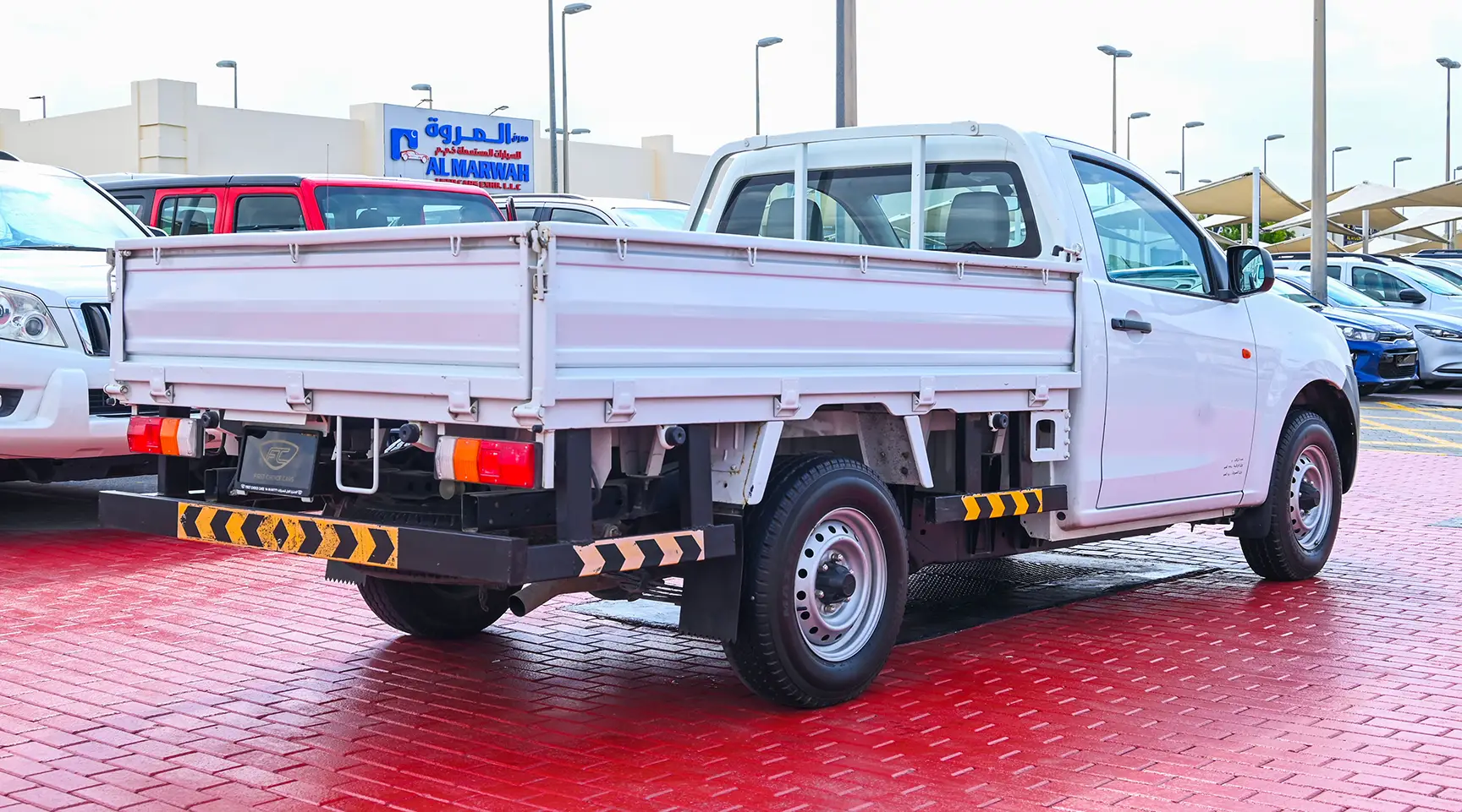 Used 2017 Isuzu D-MAX Flatbed White – Right Back Diagonal (45°) View at First Choice Cars Sharjah