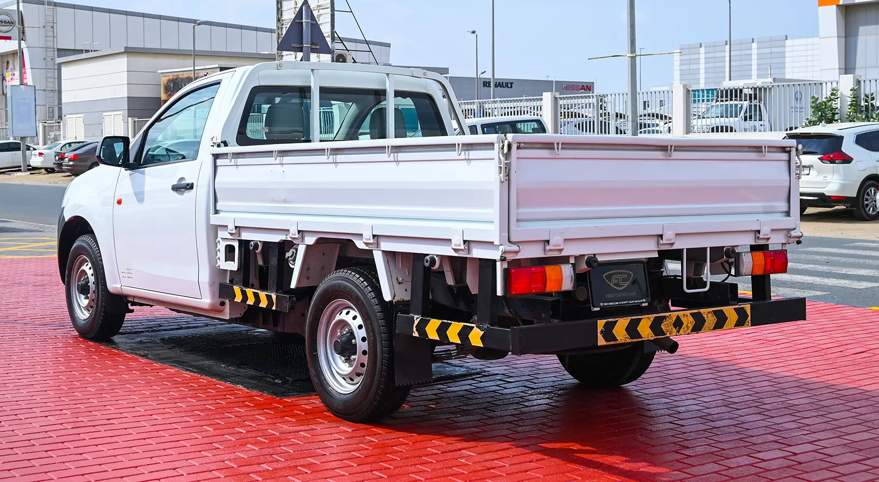Used 2017 Isuzu D-MAX Flatbed White – Left Back Diagonal (45°) View at First Choice Cars Sharjah