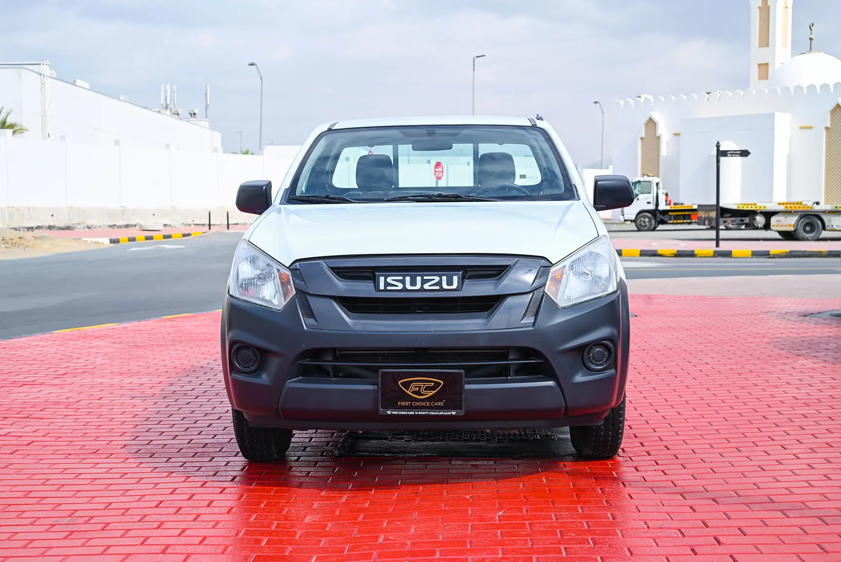 Used 2017 Isuzu D-MAX Flatbed White – Front View at First Choice Cars Sharjah