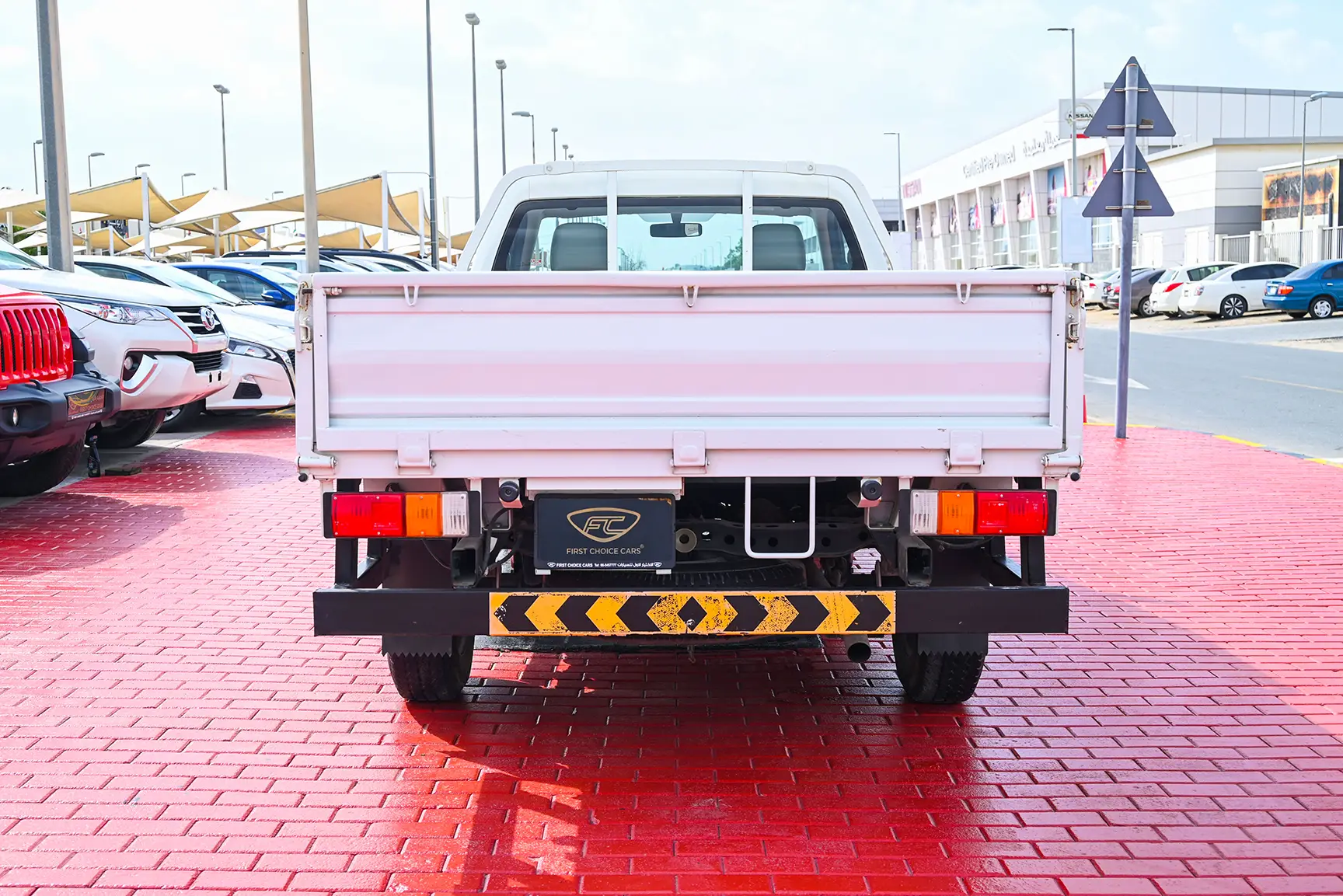 Used 2017 Isuzu D-MAX Flatbed White – Back/Rear View at First Choice Cars Sharjah