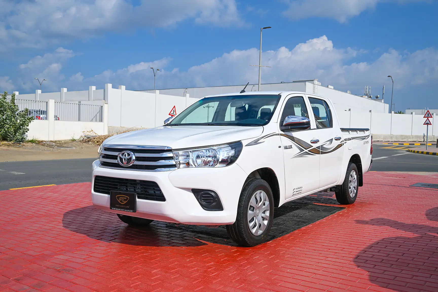 Used 2017 Toyota Hilux GL Double Cabin in White – Left Front Diagonal (45°) View for Sale at First Choice Cars Dubai Sharjah