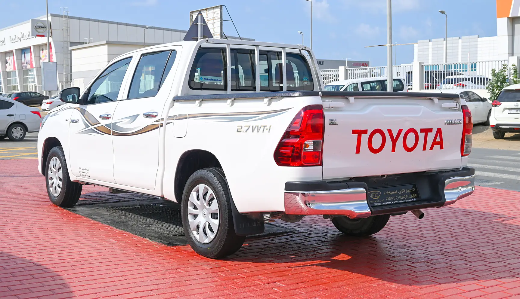 Used 2017 Toyota Hilux GL Double Cabin 2.7L 4x2 (petrol) White – Left Back Diagonal (45°) View at First Choice Cars Sharjah