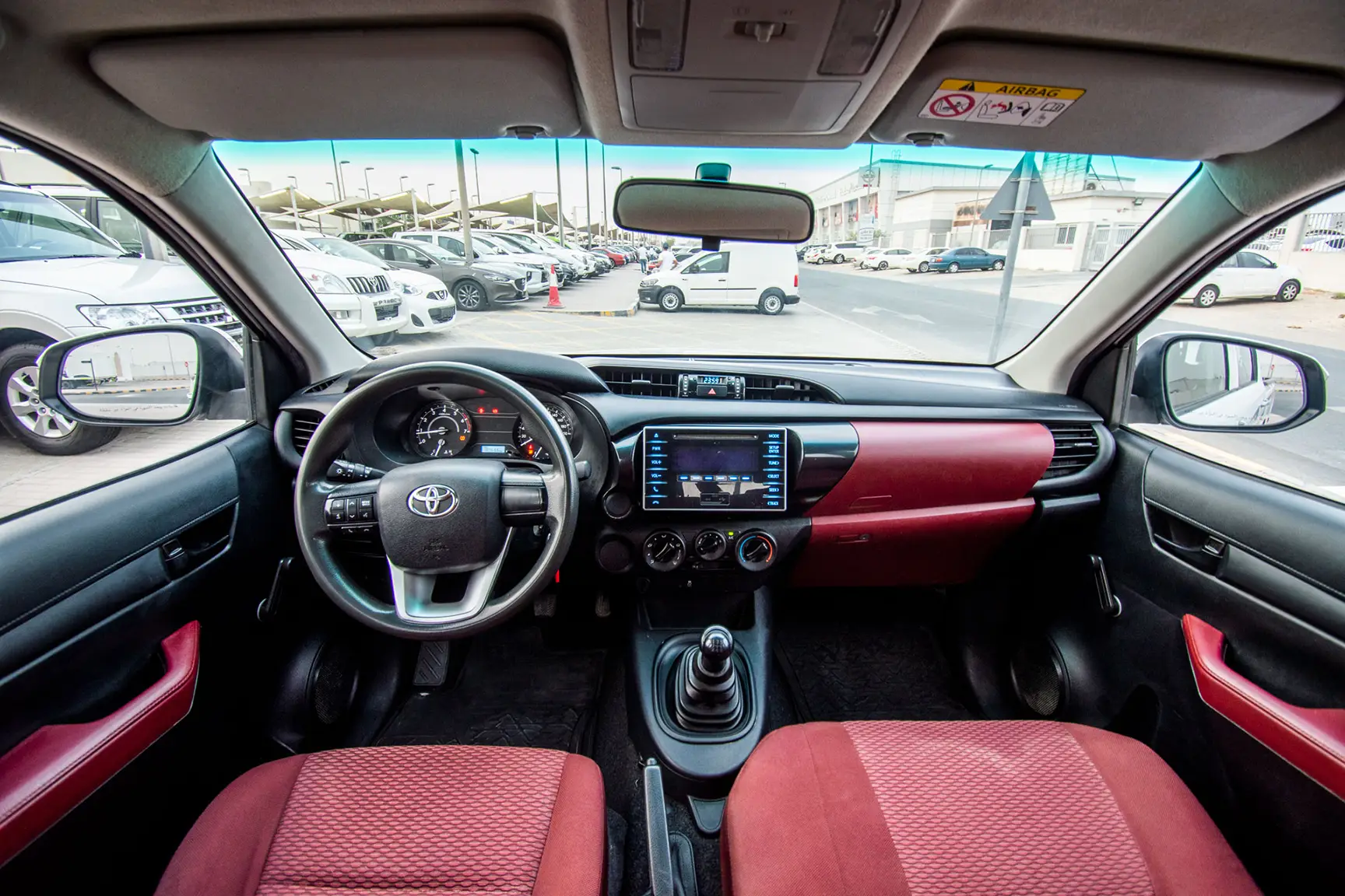 Used 2017 Toyota Hilux GL Double Cabin 2.7L 4x2 (petrol) White – Front Cabin / Dashboard Full View at First Choice Cars Sharjah