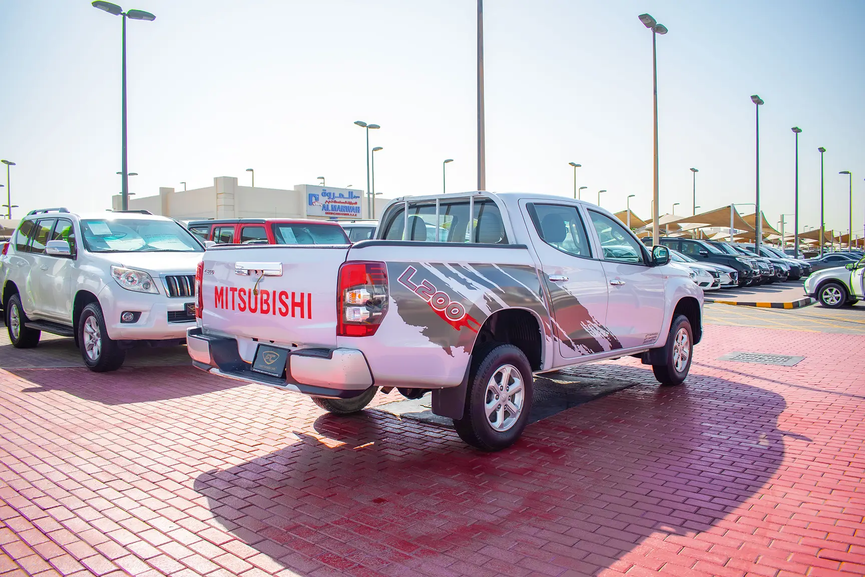Used 2020 Mitsubishi L200 GL Double Cabin in White – Right Back Diagonal (45°) View for Sale at First Choice Cars Dubai Sharjah