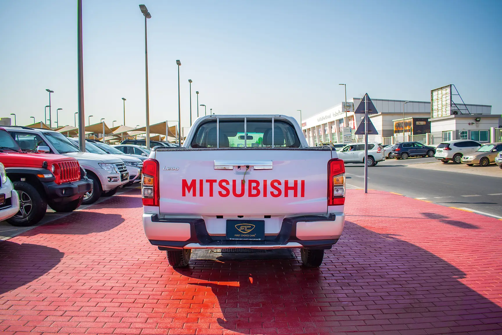 Used 2020 Mitsubishi L200 GL Double Cabin in White – Back/Rear View for Sale at First Choice Cars Dubai Sharjah