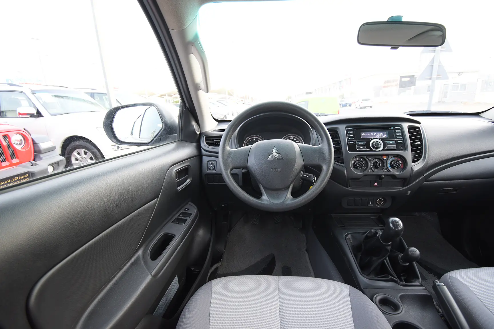 Used 2020 Mitsubishi L200 GL Double Cabin in White – Steering Wheel & Instrument Cluster for Sale at First Choice Cars Dubai Sharjah