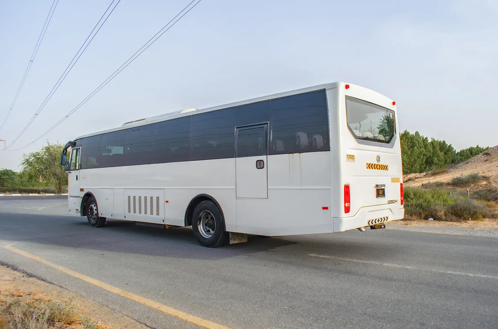 Used 2016 Ashok Leyland Falcon Bus 51-Seater White – Left Back Diagonal (45°) View at First Choice Cars Sharjah