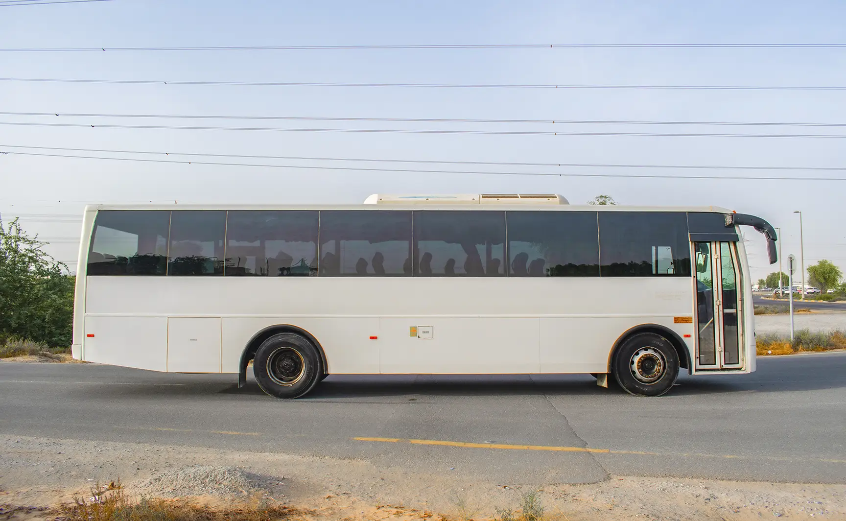 Used 2016 Ashok Leyland Falcon Bus 51-Seater White – Right Side View at First Choice Cars Sharjah