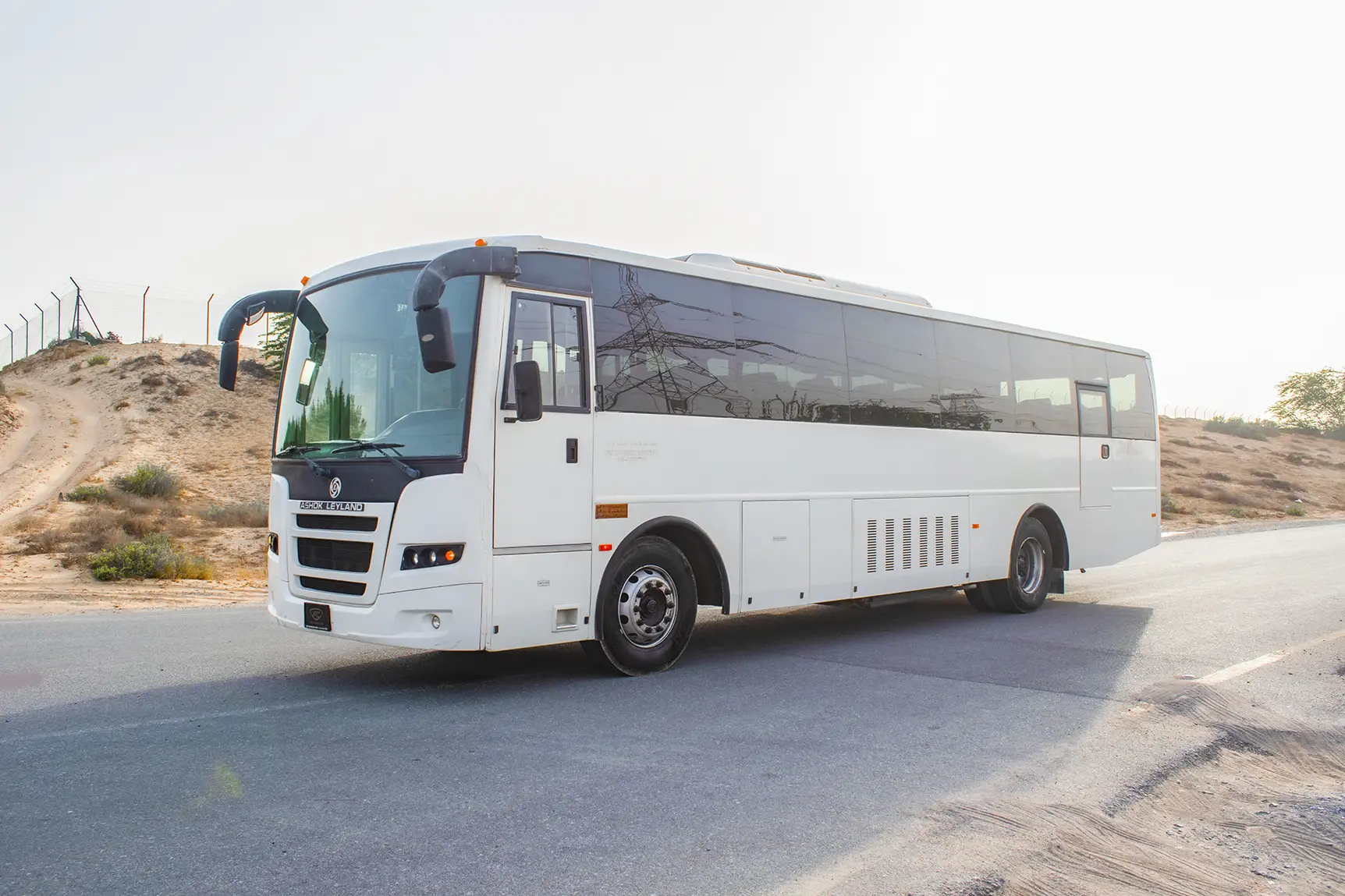 Used 2016 Ashok Leyland Falcon Bus 51-Seater White – Left Front Diagonal (45°) View at First Choice Cars Sharjah