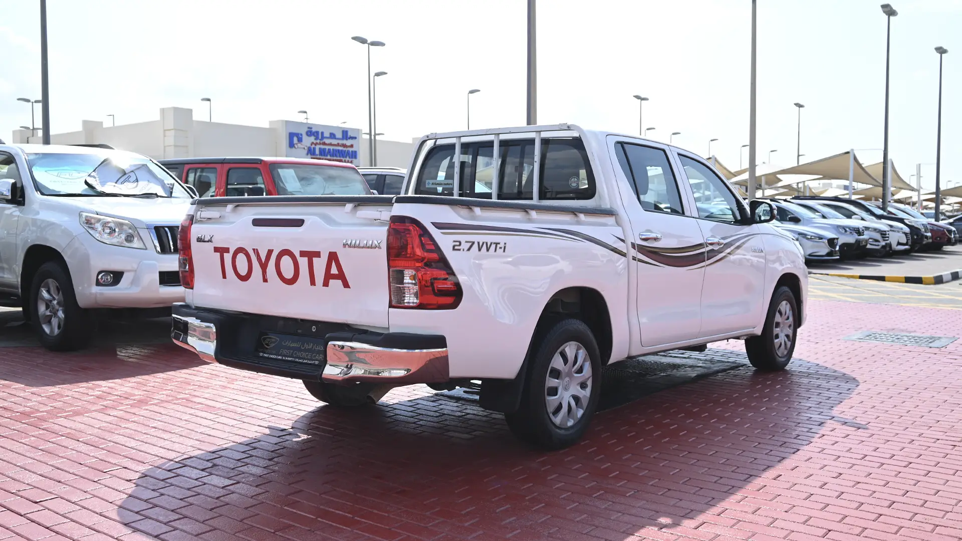 Used 2019 Toyota Hilux GL Double Cabin in White – Right Back Diagonal (45°) View for Sale at First Choice Cars Dubai Sharjah