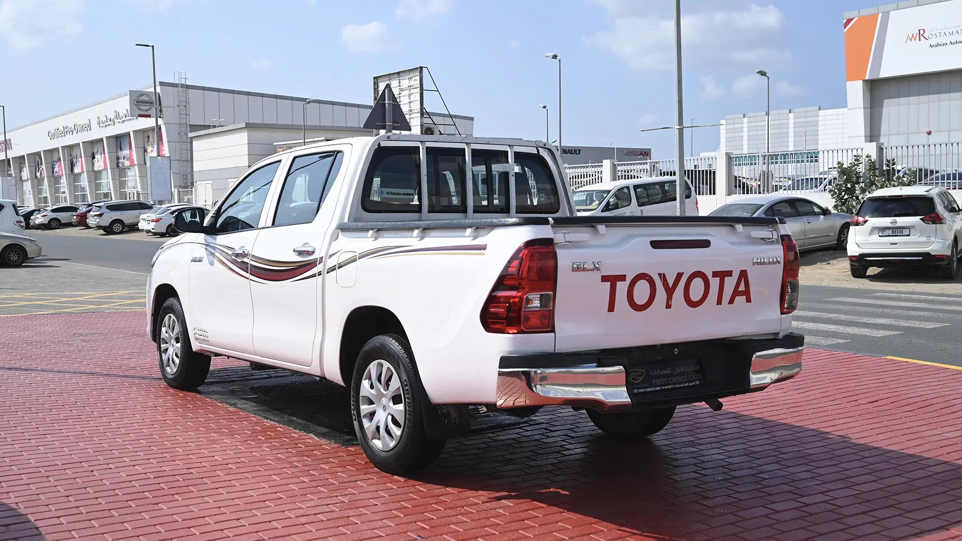 Used 2019 Toyota Hilux GL Double Cabin in White – Left Back Diagonal (45°) View for Sale at First Choice Cars Dubai Sharjah