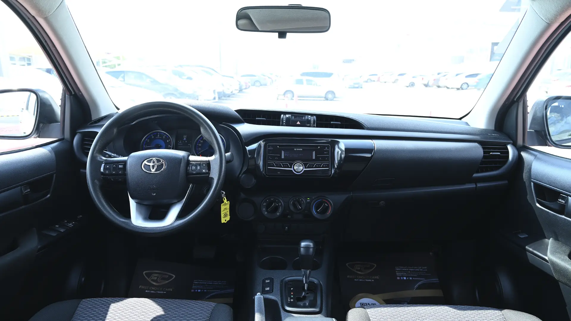 Used 2019 Toyota Hilux GL Double Cabin in White – Front Cabin / Dashboard Full View for Sale at First Choice Cars Dubai Sharjah