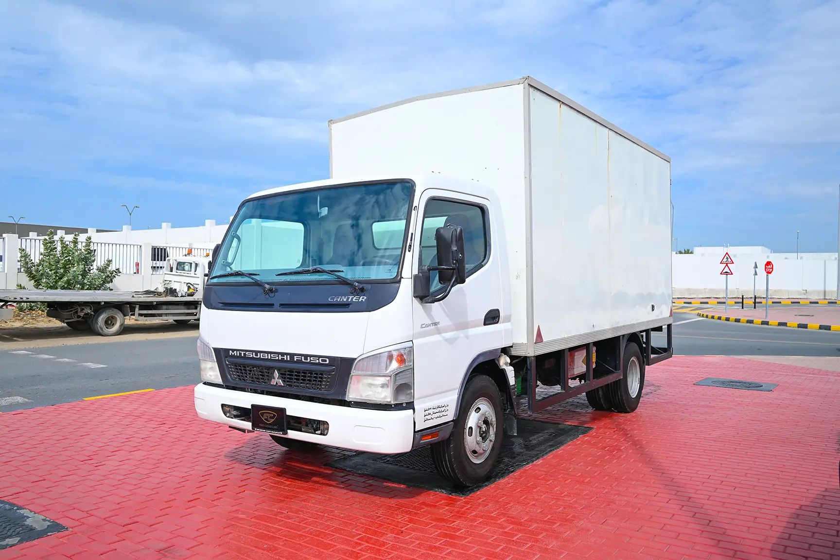Used 2016 Mitsubishi Canter Cargo Box in White – Left Front Diagonal (45°) View for Sale at First Choice Cars Dubai Sharjah