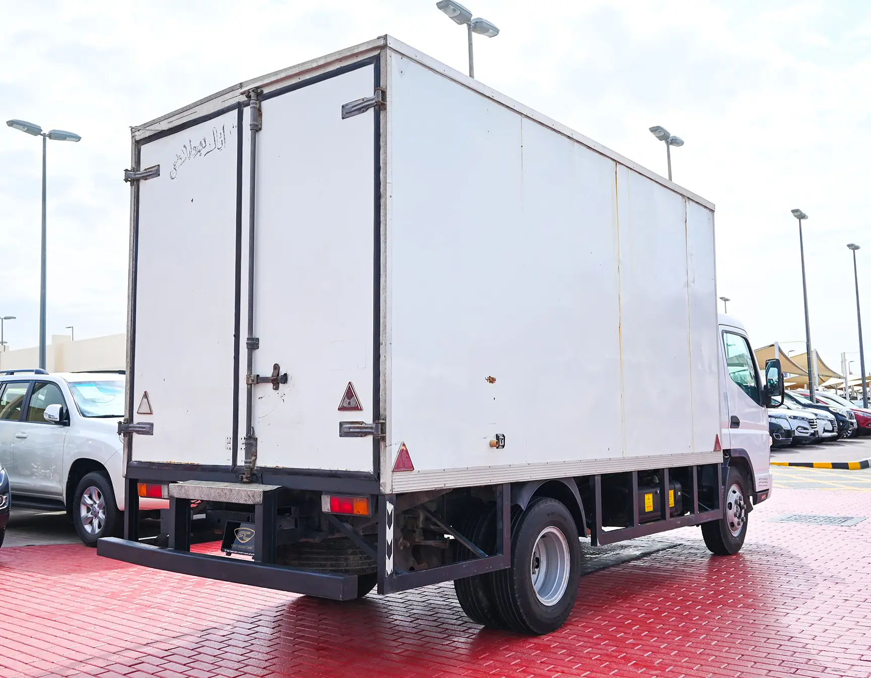 Used 2016 Mitsubishi Canter Cargo Box in White – Right Back Diagonal (45°) View for Sale at First Choice Cars Dubai Sharjah