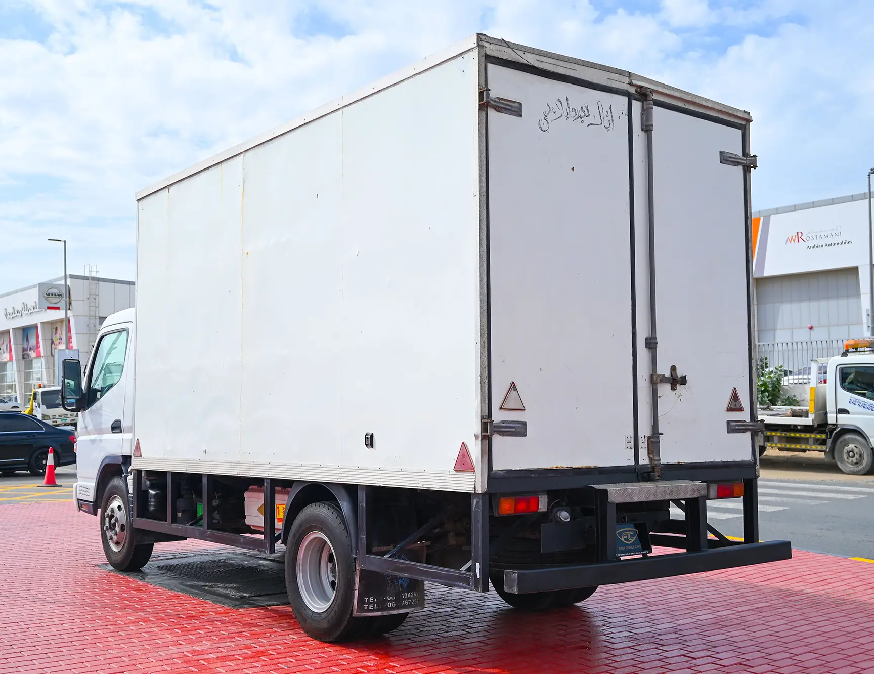 Used 2016 Mitsubishi Canter Cargo Box in White – Left Back Diagonal (45°) View for Sale at First Choice Cars Dubai Sharjah