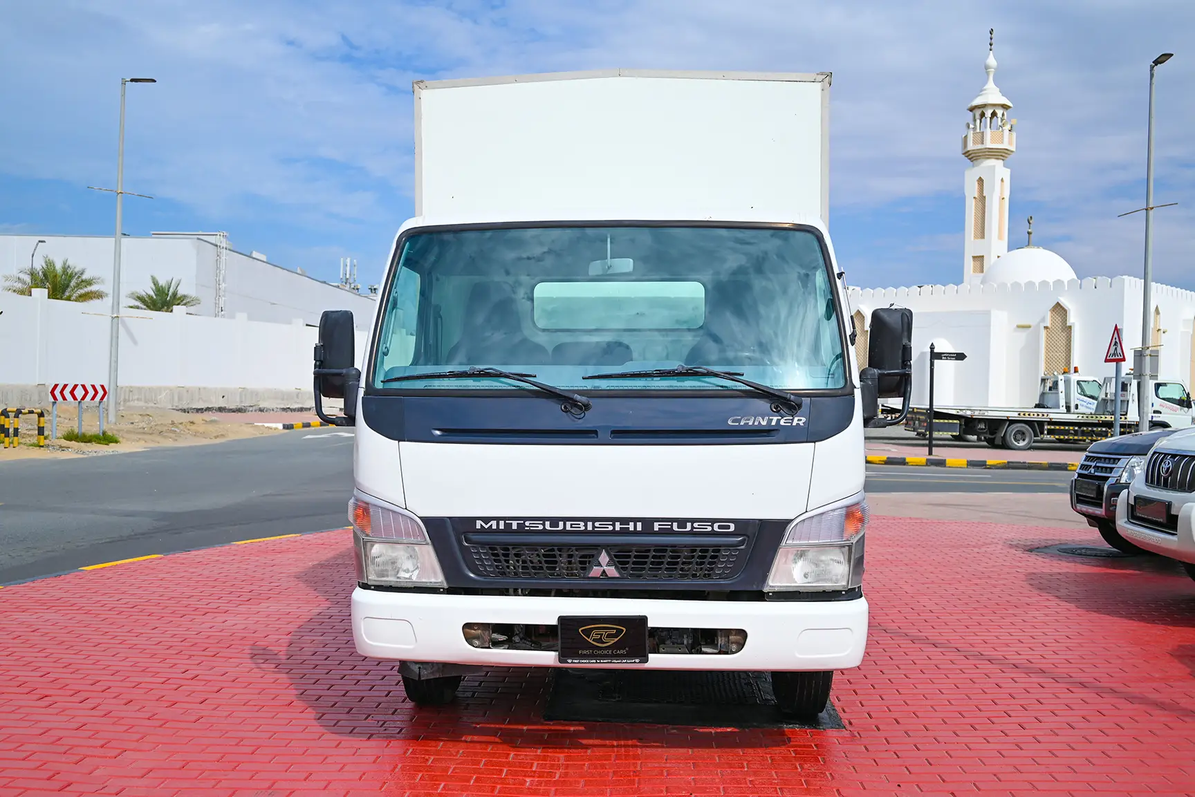 Used 2016 Mitsubishi Canter Cargo Box in White – Front View for Sale at First Choice Cars Dubai Sharjah