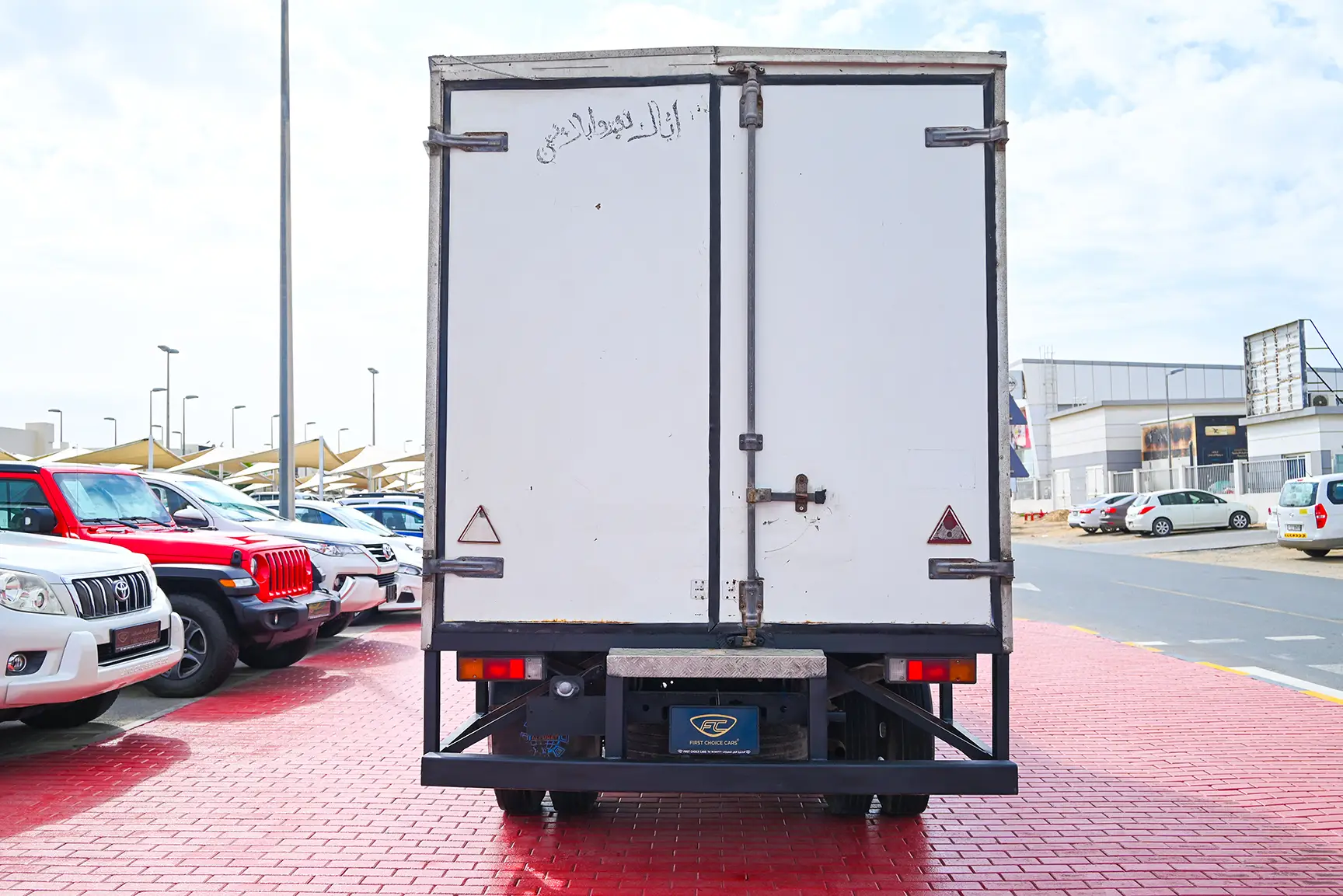 Used 2016 Mitsubishi Canter Cargo Box in White – Back/Rear View for Sale at First Choice Cars Dubai Sharjah