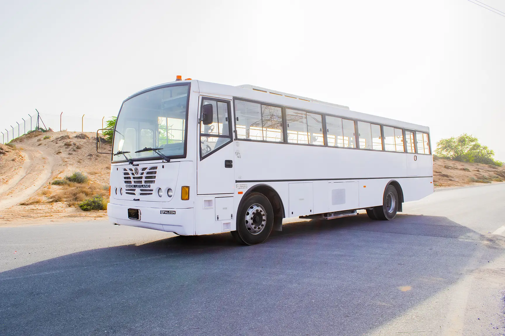 Used 2016 Ashok Leyland Falcon Bus 84-Seater White – Left Front Diagonal (45°) View at First Choice Cars Sharjah