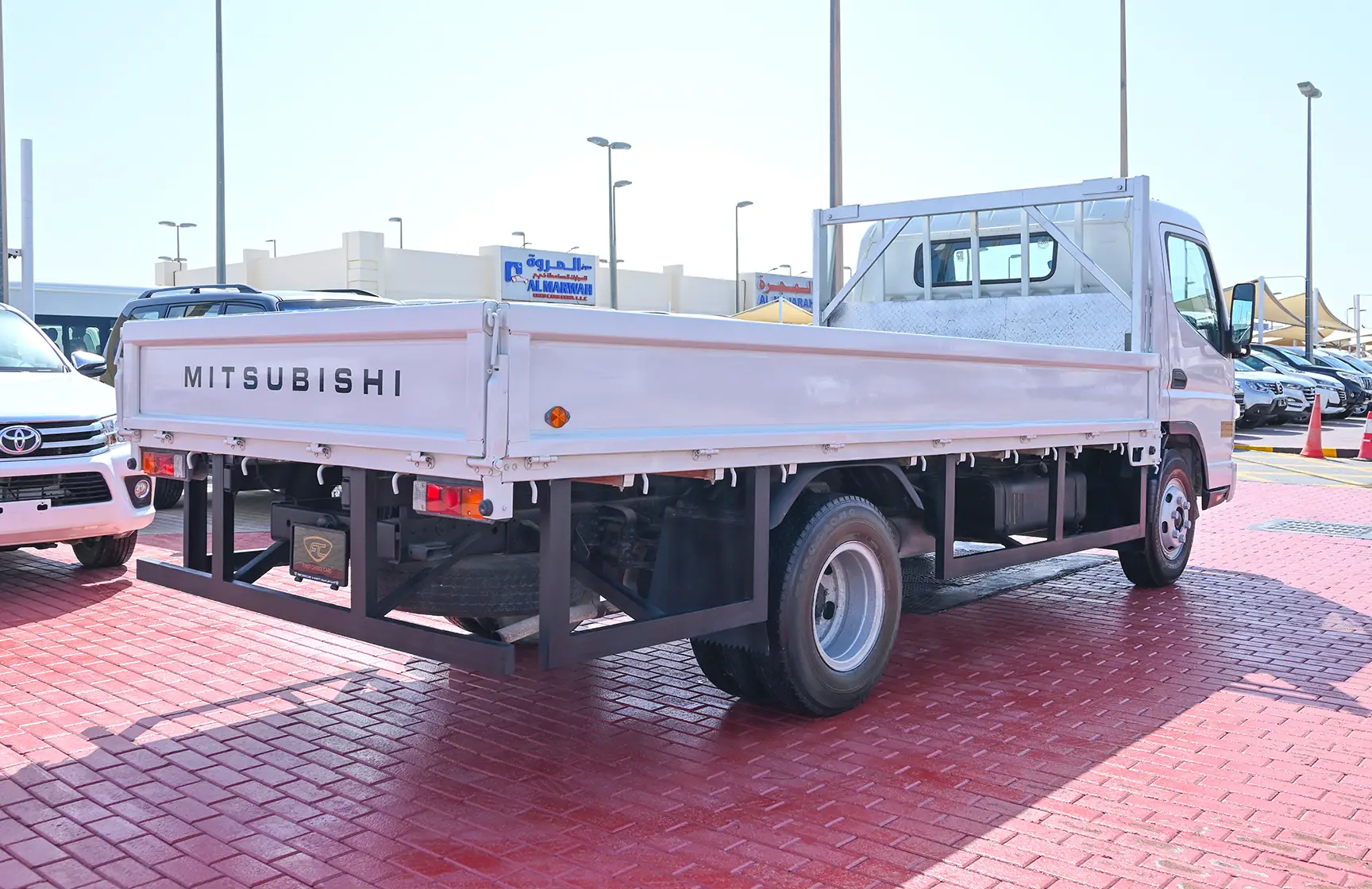 Used 2016 Mitsubishi Canter Cargo Body in White – Right Back Diagonal (45°) View for Sale at First Choice Cars Dubai Sharjah
