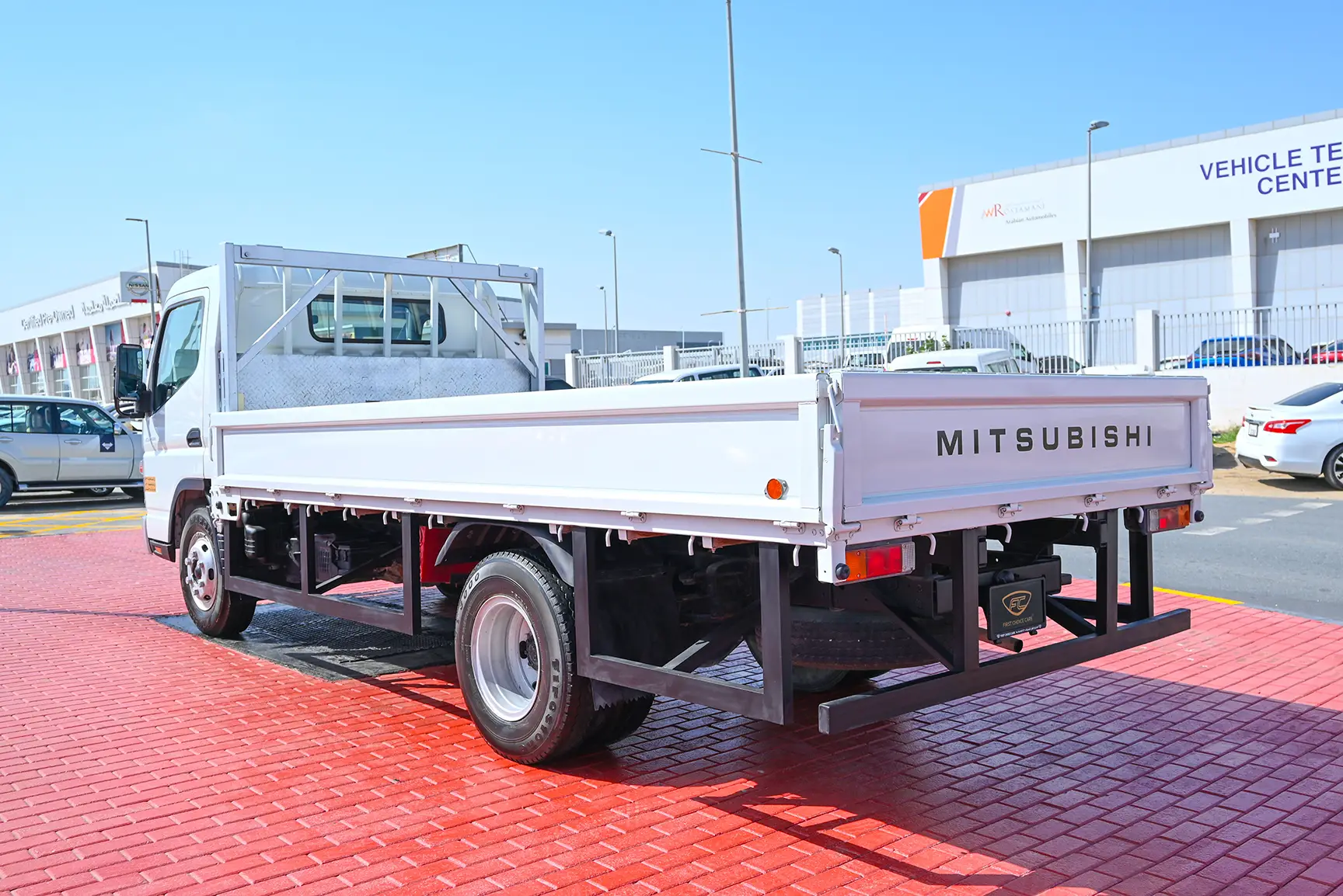 Used 2016 Mitsubishi Canter Cargo Body in White – Left Back Diagonal (45°) View for Sale at First Choice Cars Dubai Sharjah
