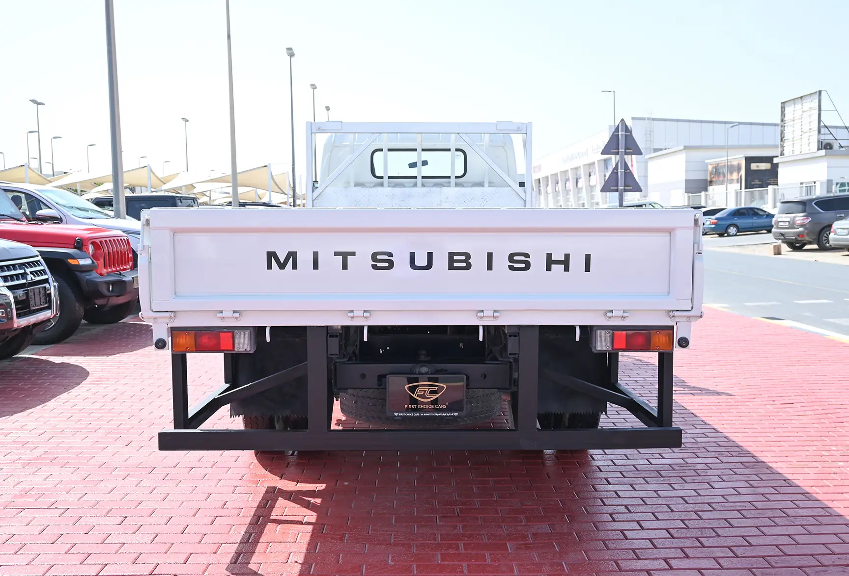Used 2016 Mitsubishi Canter Cargo Body in White – Back/Rear View for Sale at First Choice Cars Dubai Sharjah