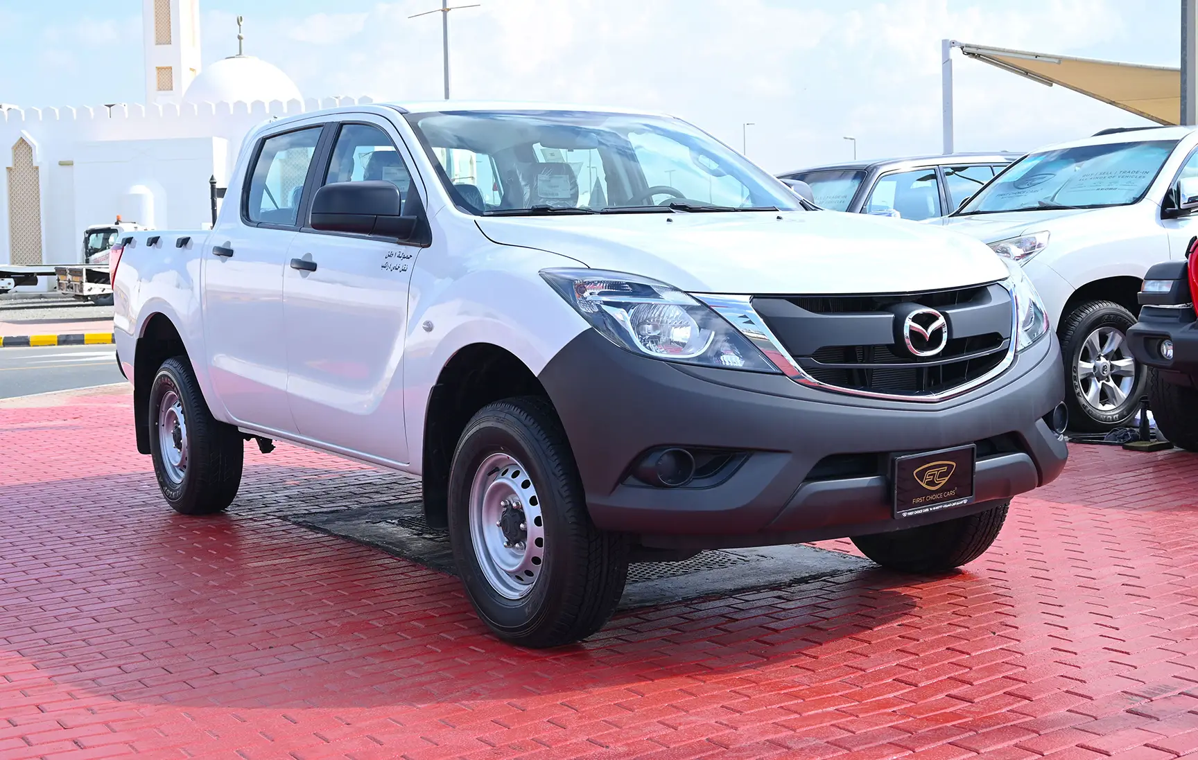 Used 2020 Mazda BT-50 Double Cab 4WD White – Right Front Diagonal (45°) View at First Choice Cars Sharjah