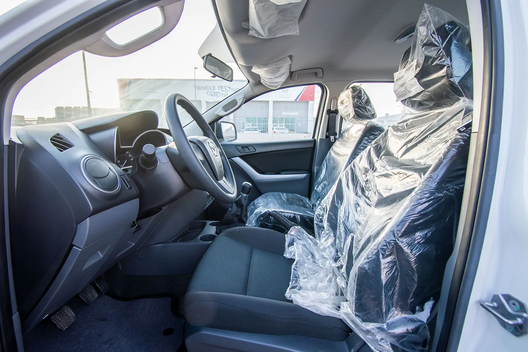 Used 2020 Mazda BT-50 Double Cab 4WD White – Front Driver Side Cabin View at First Choice Cars Sharjah