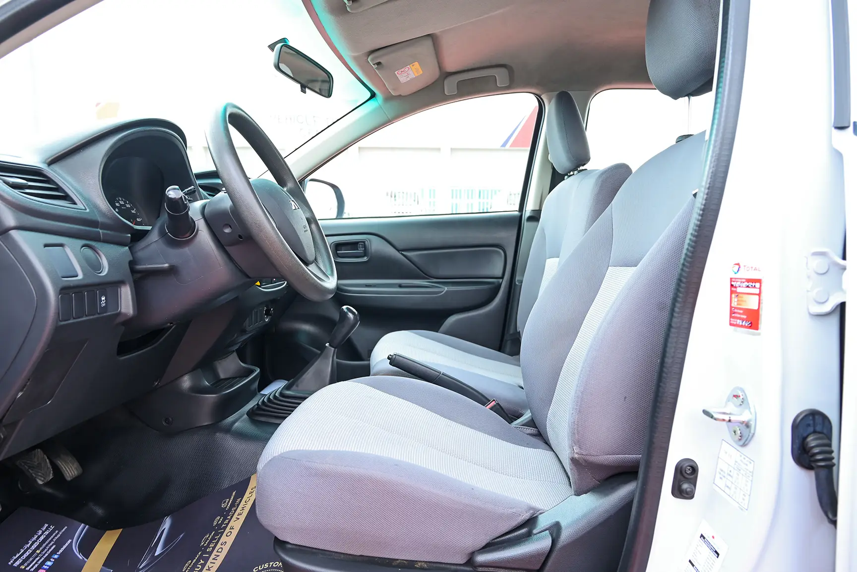 Used 2020 Mitsubishi L200 GL Double Cabin White – Front Driver Side Cabin View at First Choice Cars Sharjah