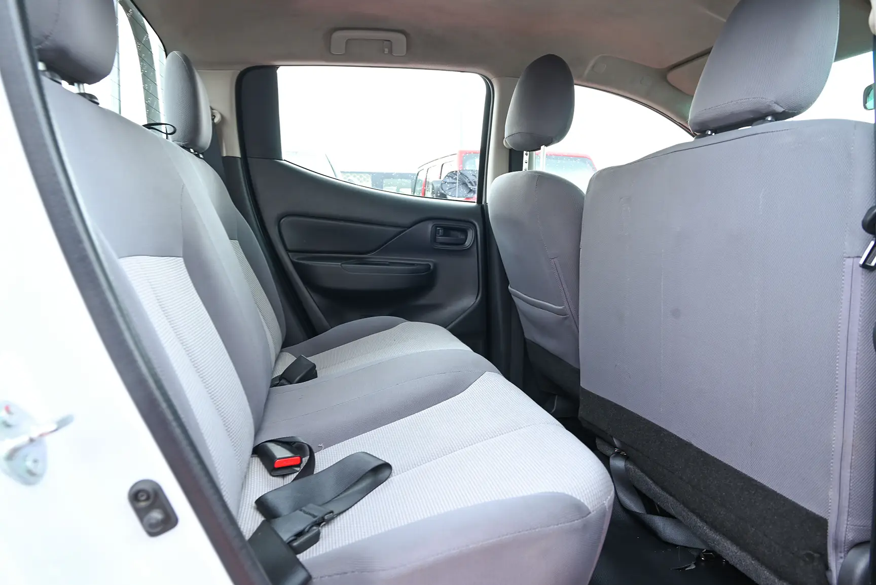 Used 2020 Mitsubishi L200 GL Double Cabin White – Rear Passenger Side Cabin View at First Choice Cars Sharjah