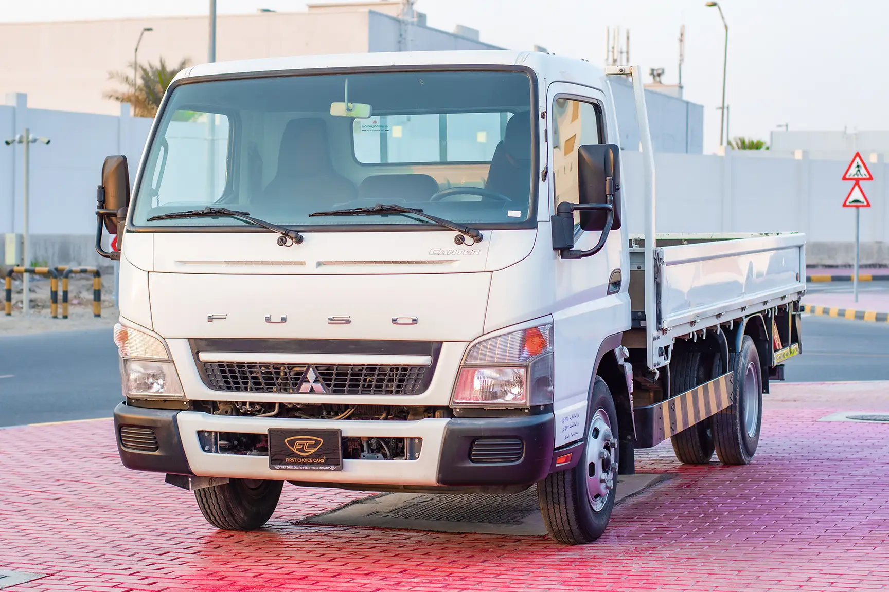 Used 2017 Mitsubishi Canter Cargo Body White – Left Front Diagonal (45°) View at First Choice Cars Sharjah