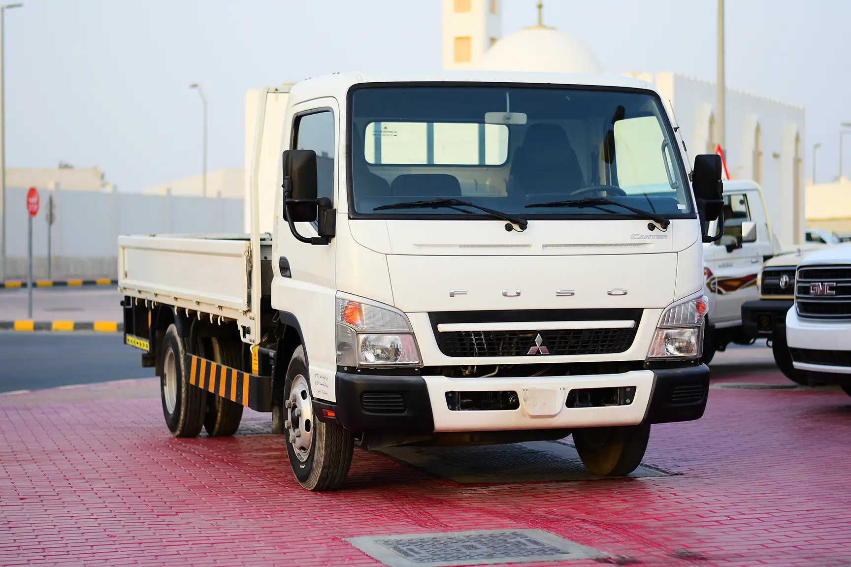 Used 2017 Mitsubishi Canter Cargo Body White – Right Front Diagonal (45°) View at First Choice Cars Sharjah