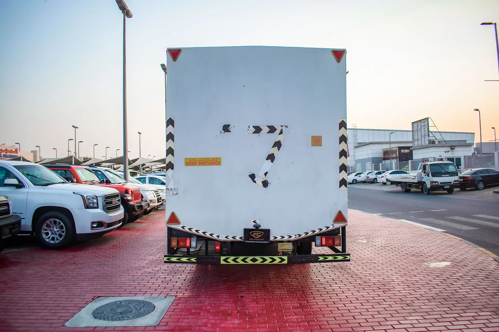 Used 2020 Isuzu NPR Shutter Body White – Back/Rear View at First Choice Cars Sharjah