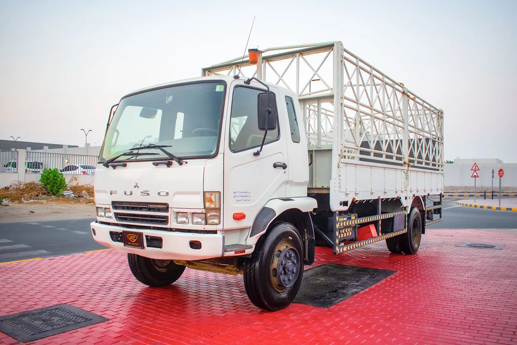 Used 2016 Mitsubishi Canter Cargo Body in White – Left Front Diagonal (45°) View for Sale at First Choice Cars Dubai Sharjah