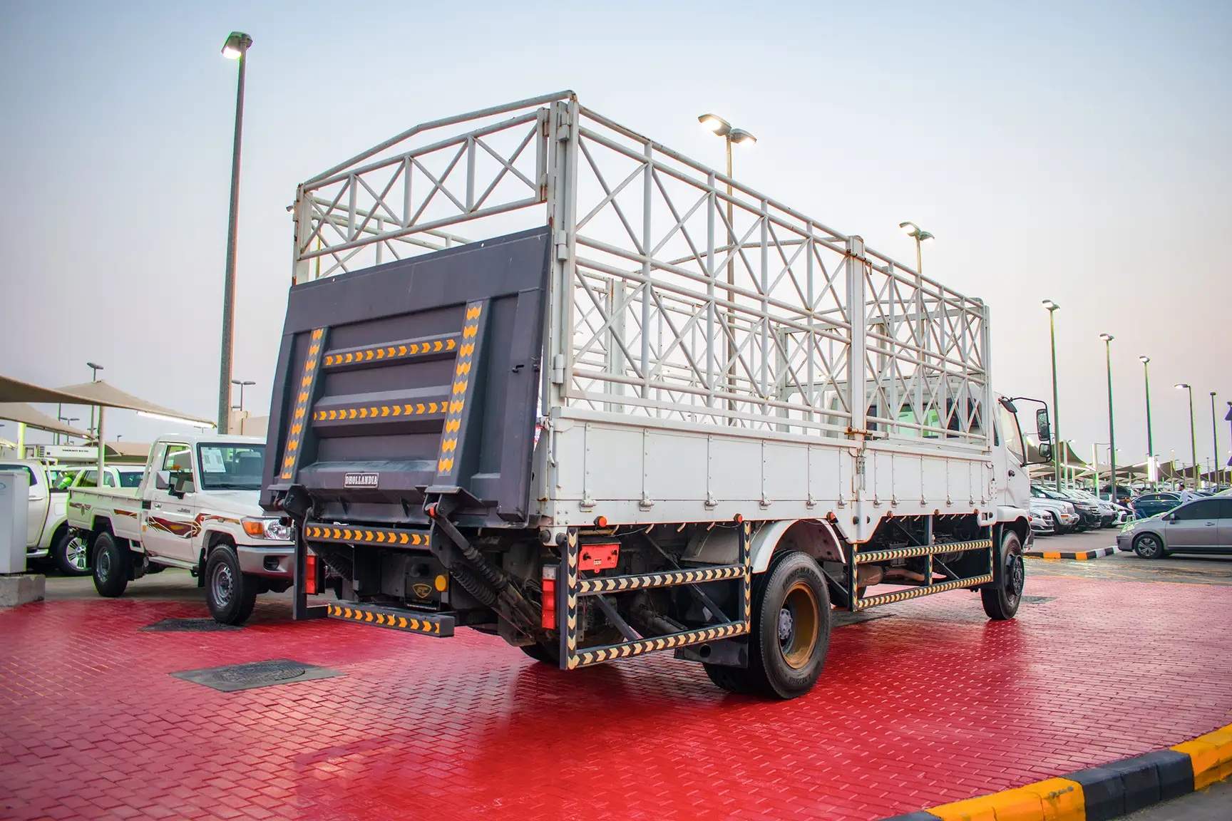 Used 2016 Mitsubishi Canter Cargo Body White – Right Back Diagonal (45°) View at First Choice Cars Sharjah