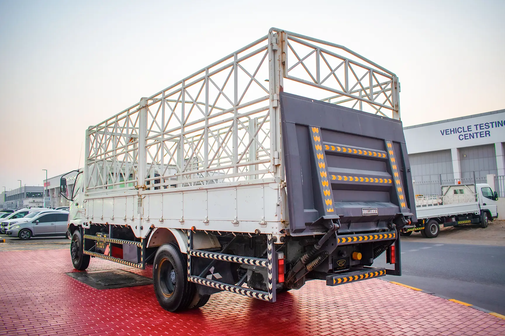 Used 2016 Mitsubishi Canter Cargo Body White – Left Back Diagonal (45°) View at First Choice Cars Sharjah