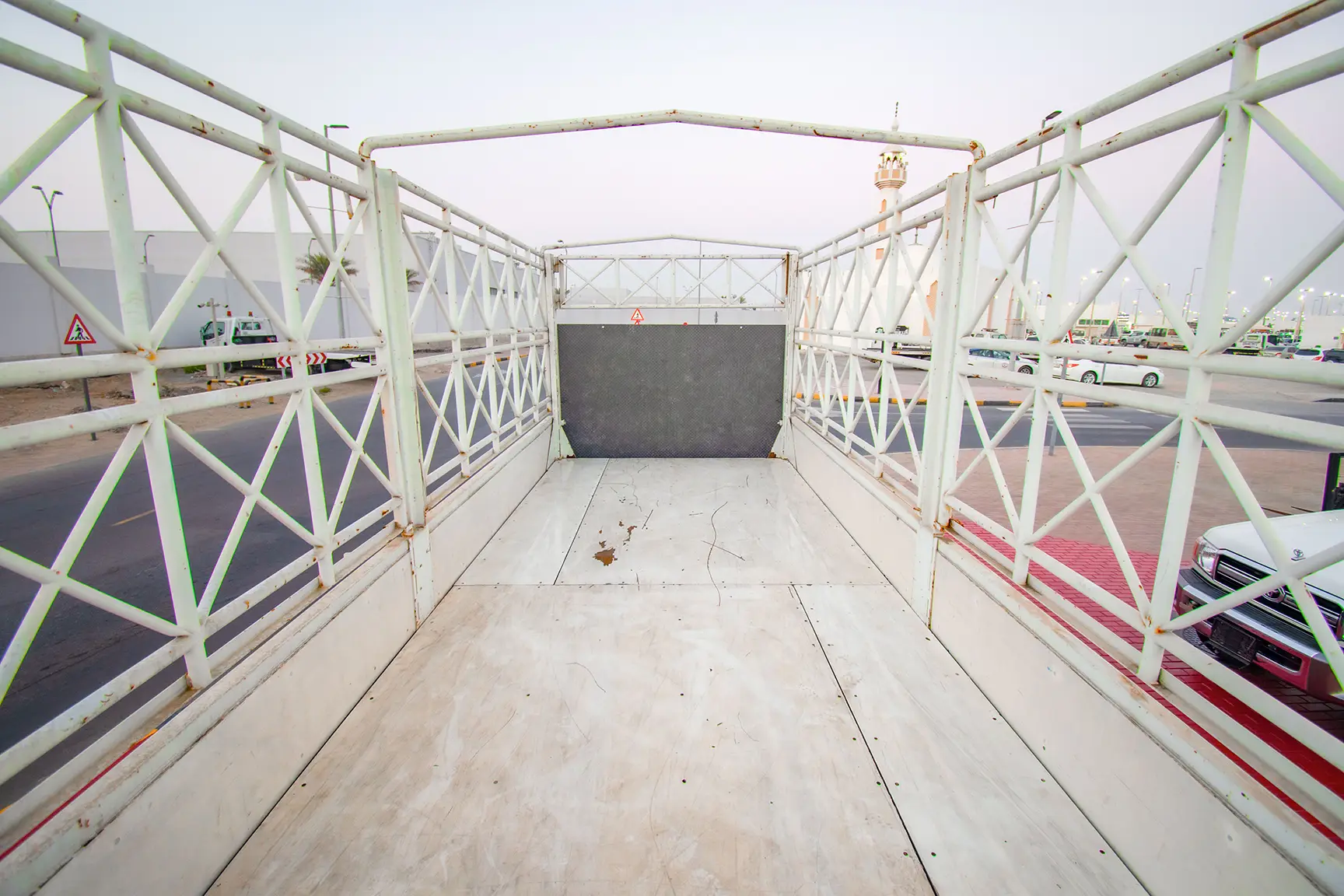 Used 2016 Mitsubishi Canter Cargo Body White – Cargo Bed Rear-to-Front View at First Choice Cars Sharjah