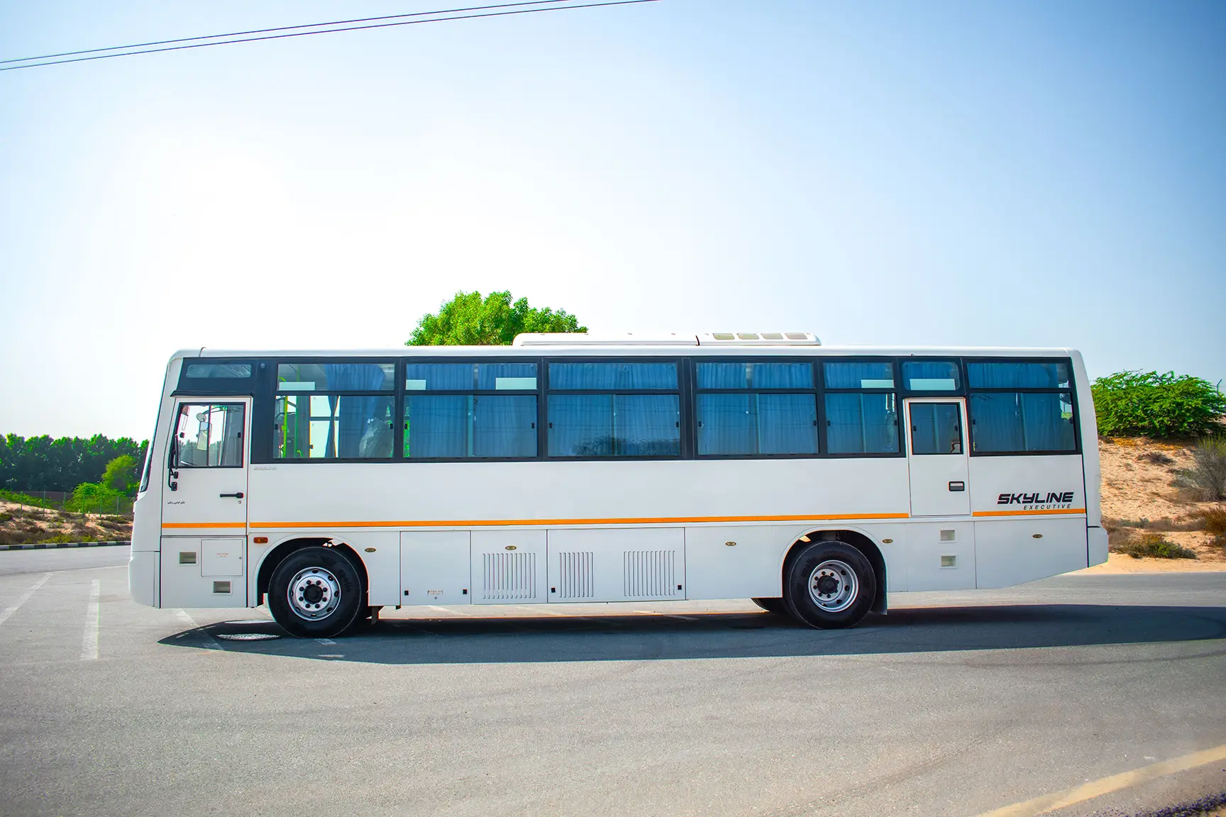 Used 2019 Eicher Skyline Bus 58-Seater White – Left Side View at First Choice Cars Sharjah